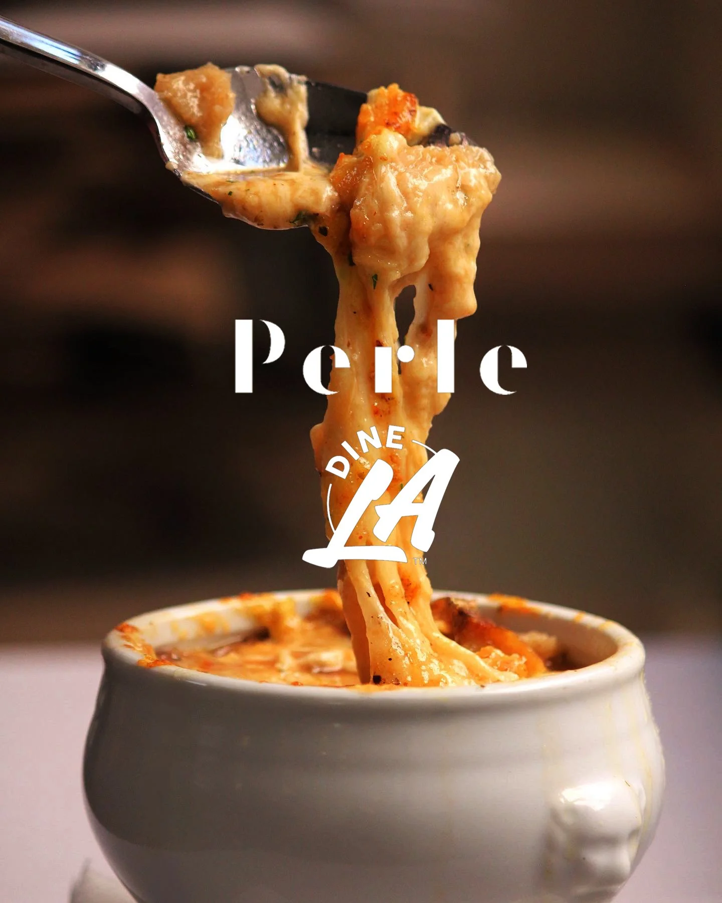 Image of French onion soup with “Perle” and “DineLA” logos