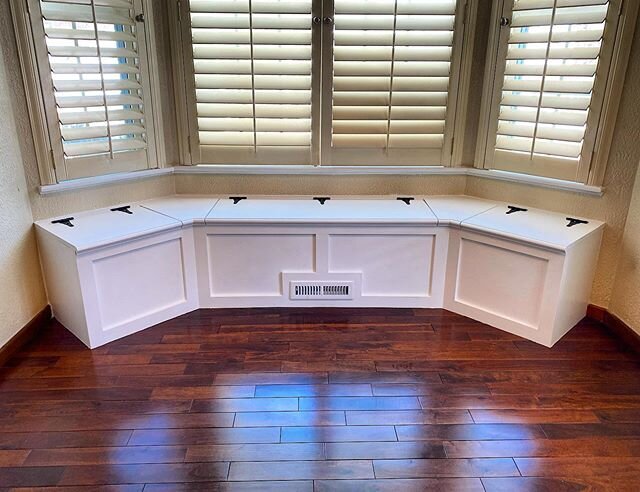 This kitchen nook just got a lot more cozy with this custom window bench ...There&rsquo;s just something about stark white against a walnut floor that really makes a room.