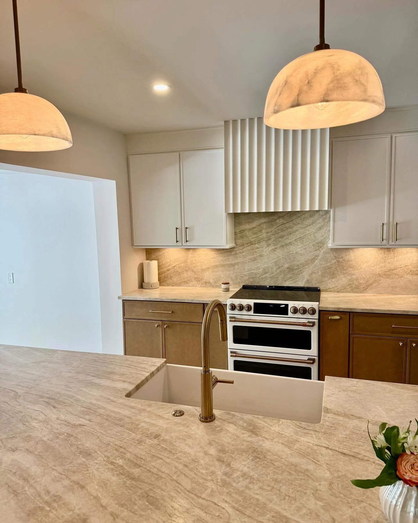 This St Pete kitchen has timeless style. 
Taj Mahal leather countertops, ProCraft slim shaker

#tajmahalcountertops #leathermarble #customventhood #ptocraftcabinetry #depotgranite #andersonlumber #womancontractor #slimshaker
#stpetersburg #whatflood 
