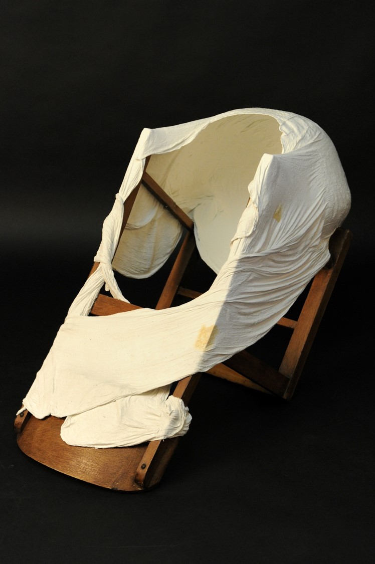 Unconsious Transference - Wooden chair, white cement, muslin, dimensions 1.2m x 40cm, 2012 Image-Nu Image.jpg