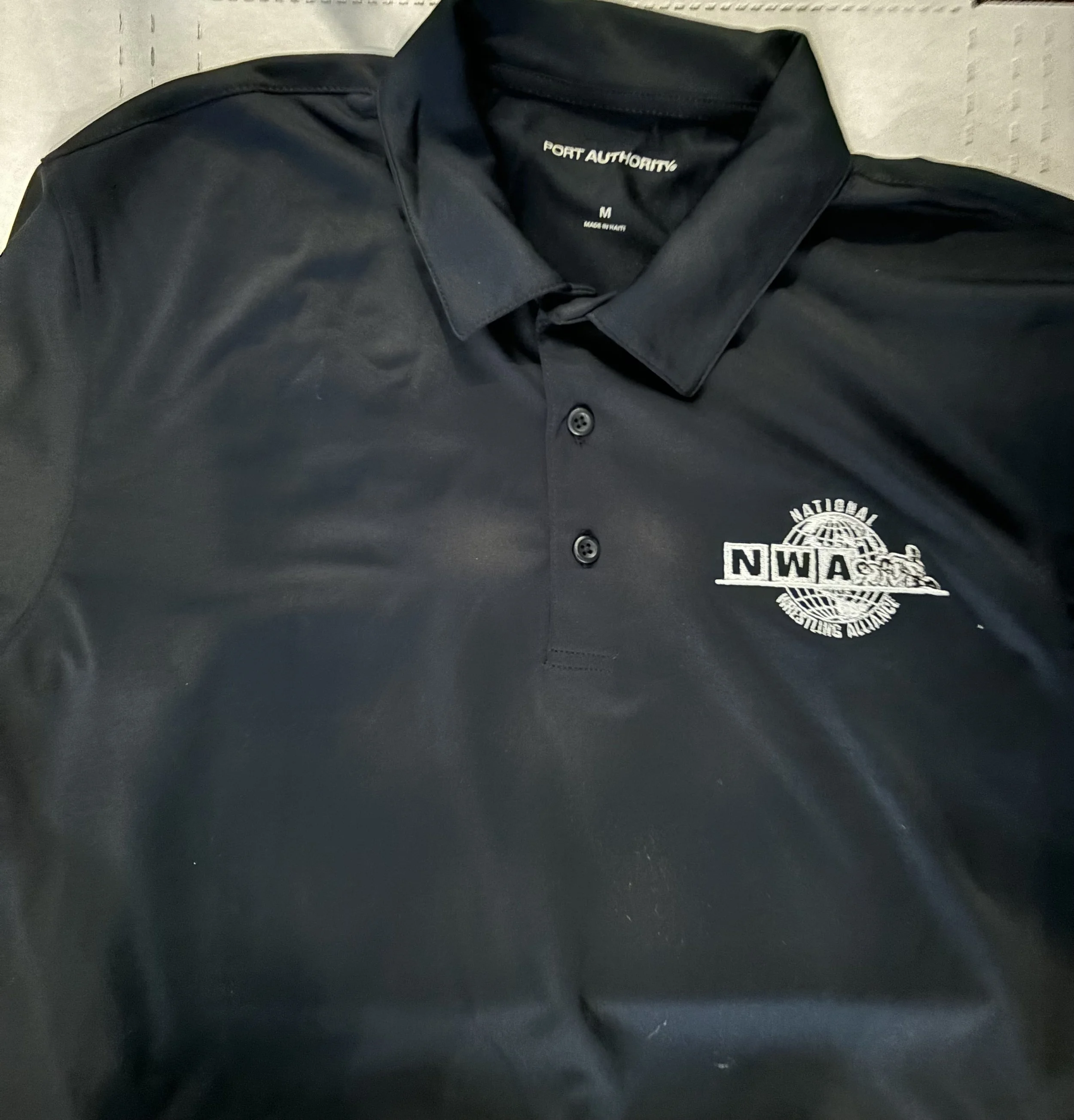Official National Wrestling Alliance POWERRR Grey Globe Crew Polo Collared Shirt