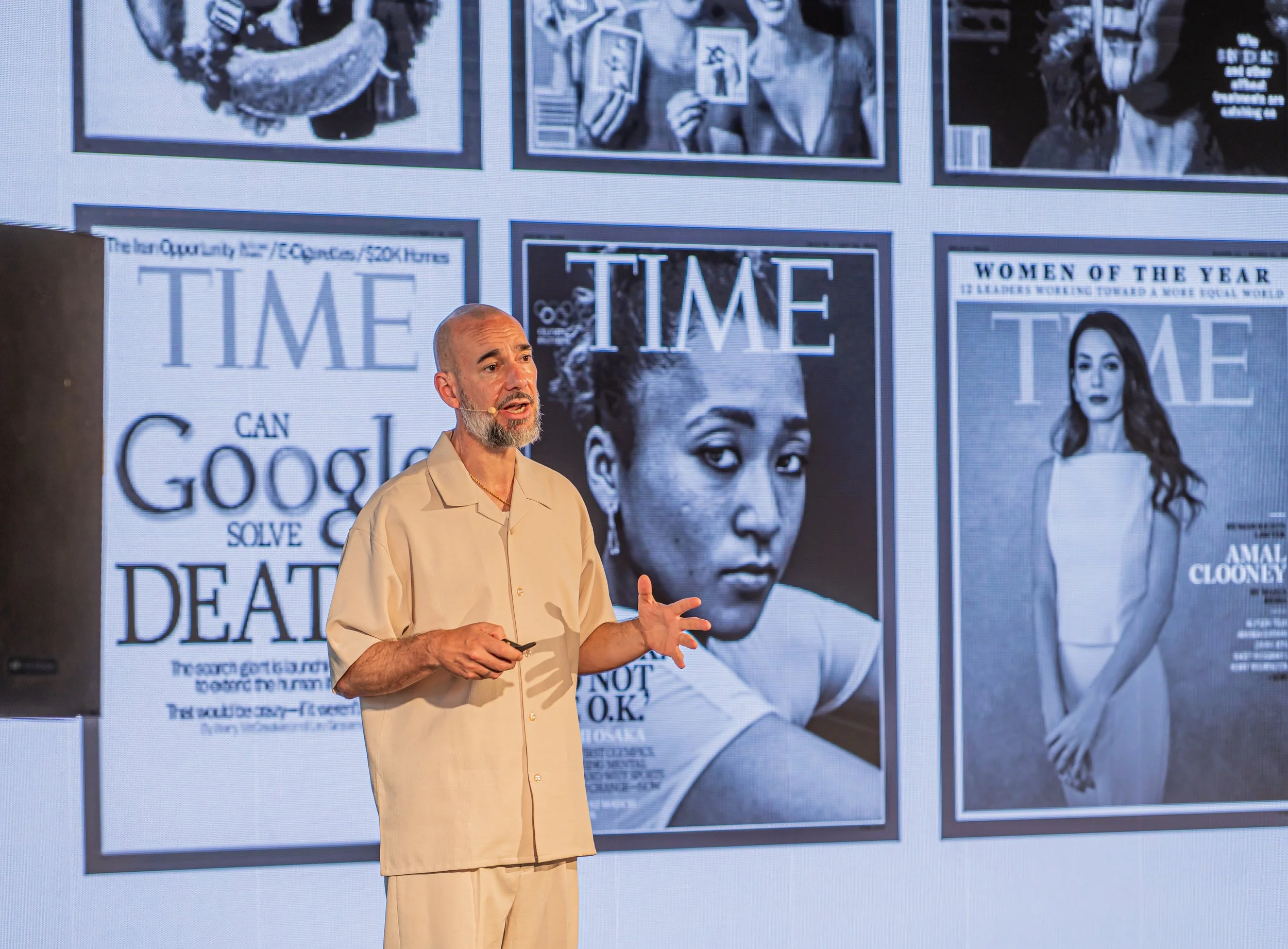  A carousel of images from a PARADIGMS event in Marrakesh featuring keynote presentations, vibrant stage designs, and an engaged audience inside a historic venue. 