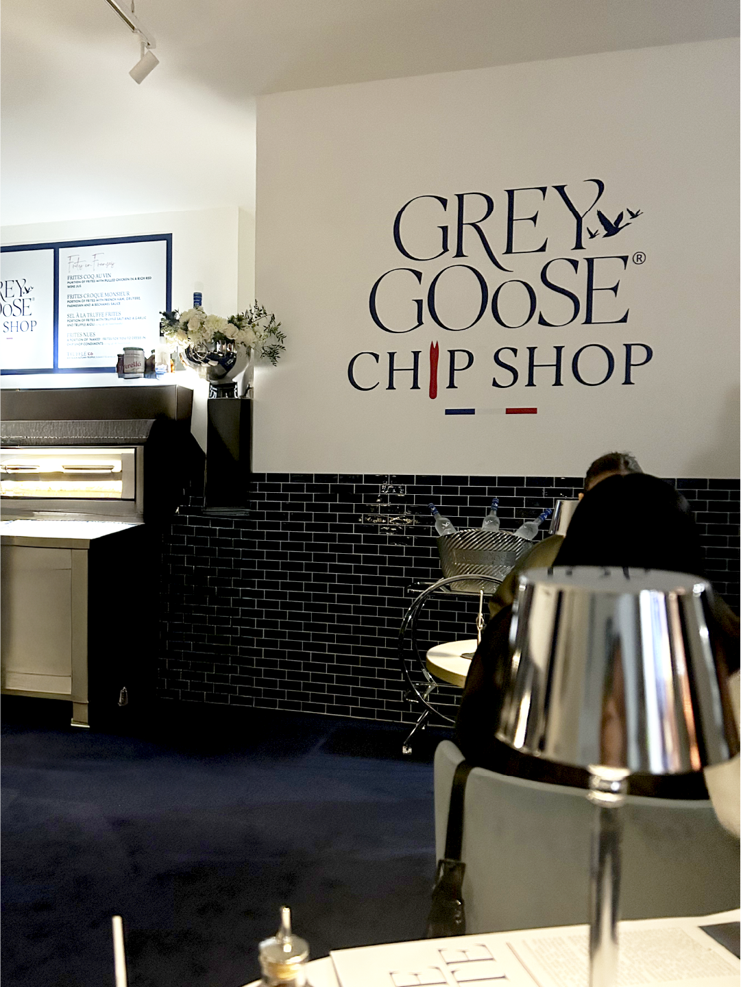  Grey Goose Chip Shop brand activation at 59 Greek Street, Soho, London this December, featuring a stylish interior with Grey Goose branding, elegant décor, and premium dining experience. 