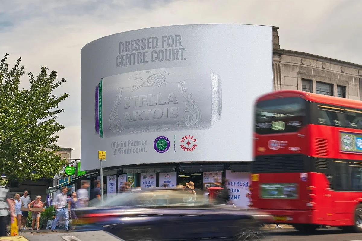  Stella Artois ‘Dressed for Wimbledon’ campaign billboard in London, featuring an embossed limited‑edition Wimbledon chalice design and official tournament partnership branding on a prominent outdoor advertising display. 