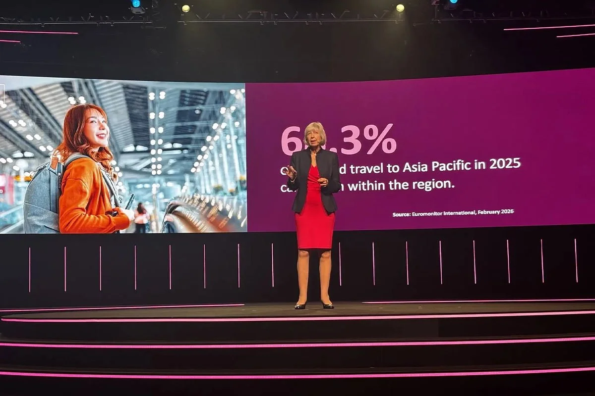 On-stage presentation at TFWA Asia Pacific 2026 featuring travel growth data and airport visuals, delivered as part of a keynote session by TFWA leadership.