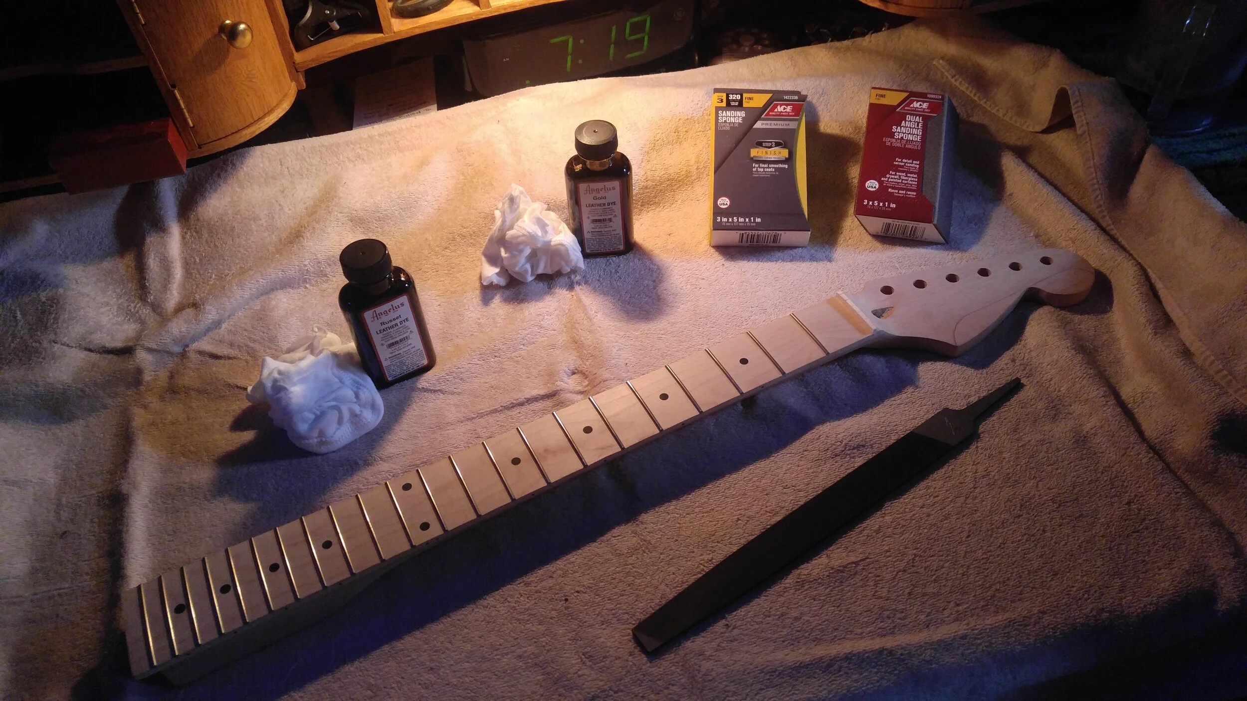 Raw, unstained neck, fret edges filed down.