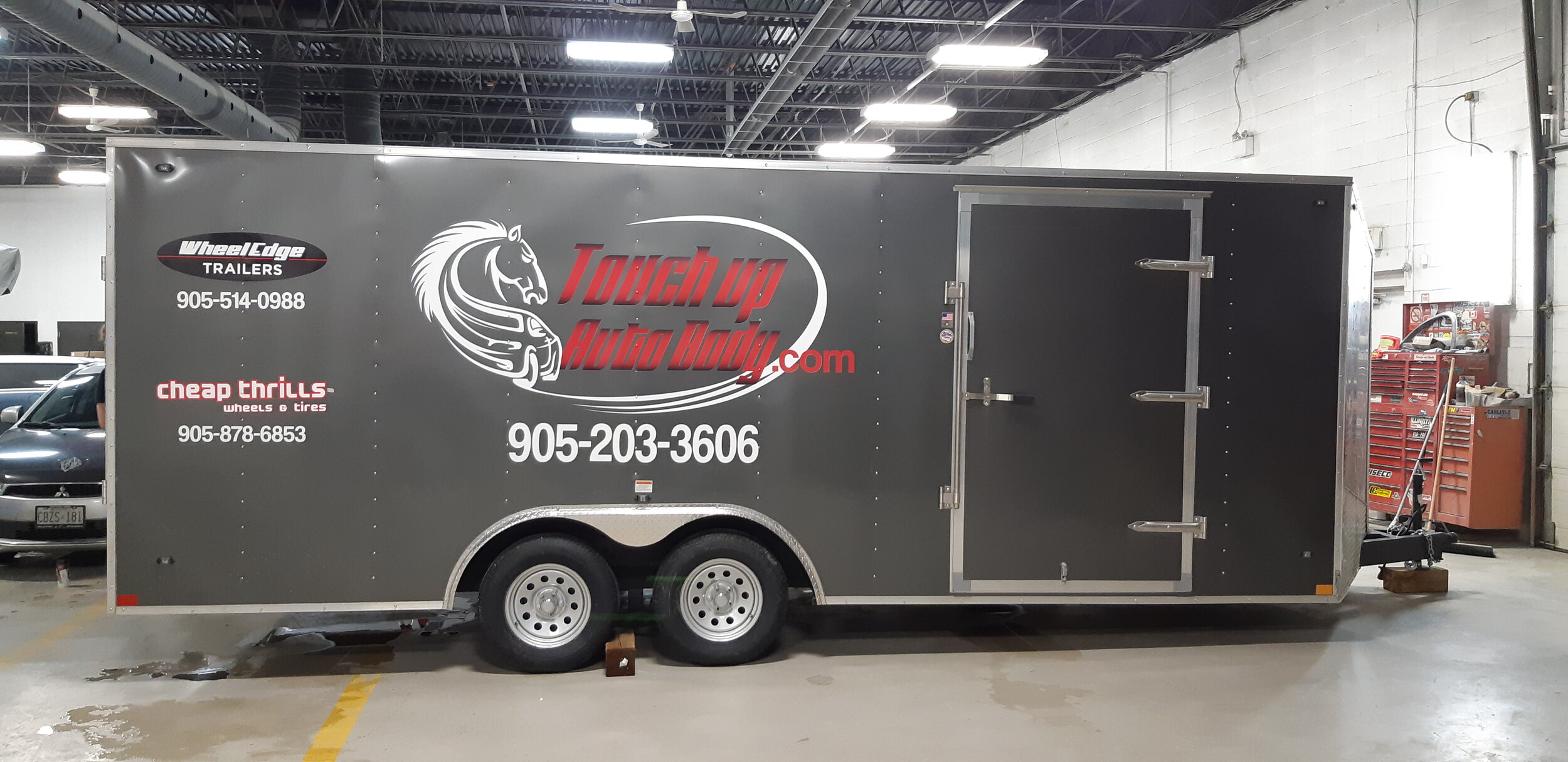 Miltown Signs printed and installed vinyl decals on car trailer.