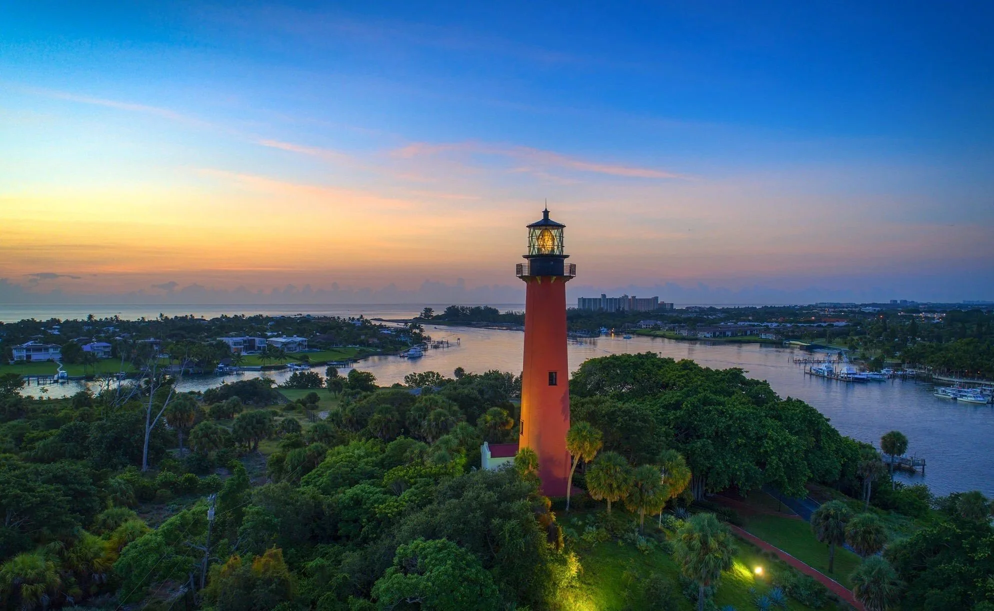Jupiter Inlet Lighthouse sunset view - DDIMG Private Wealth Management Jupiter, Fl