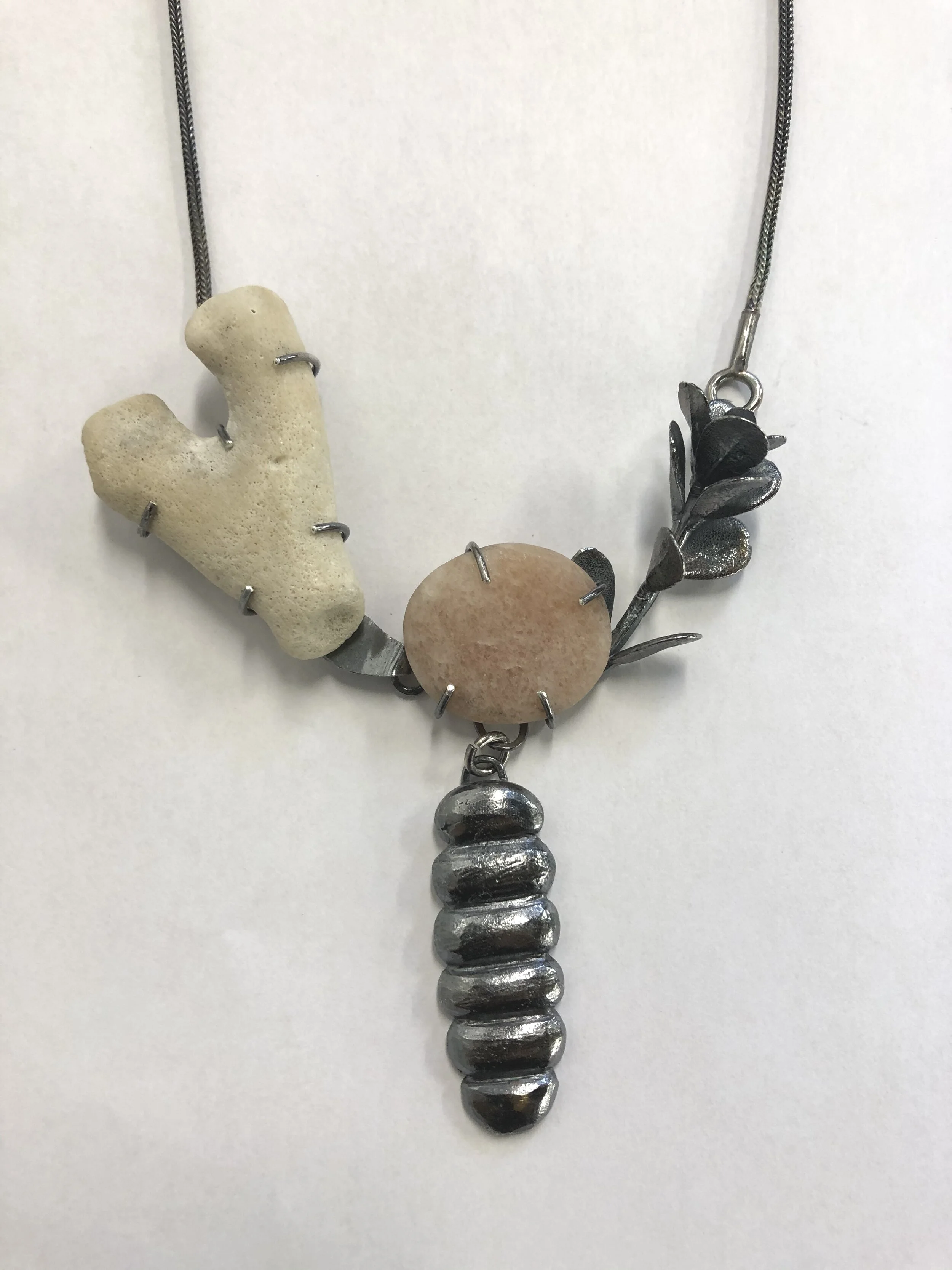  Coral, rose quartz beach stone and cast sterling silver boxwood with a cast, carved drop. 
