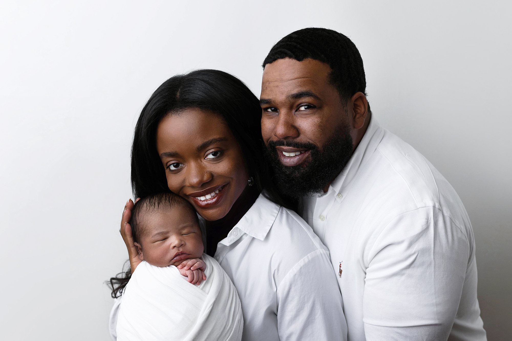 black newborn family
