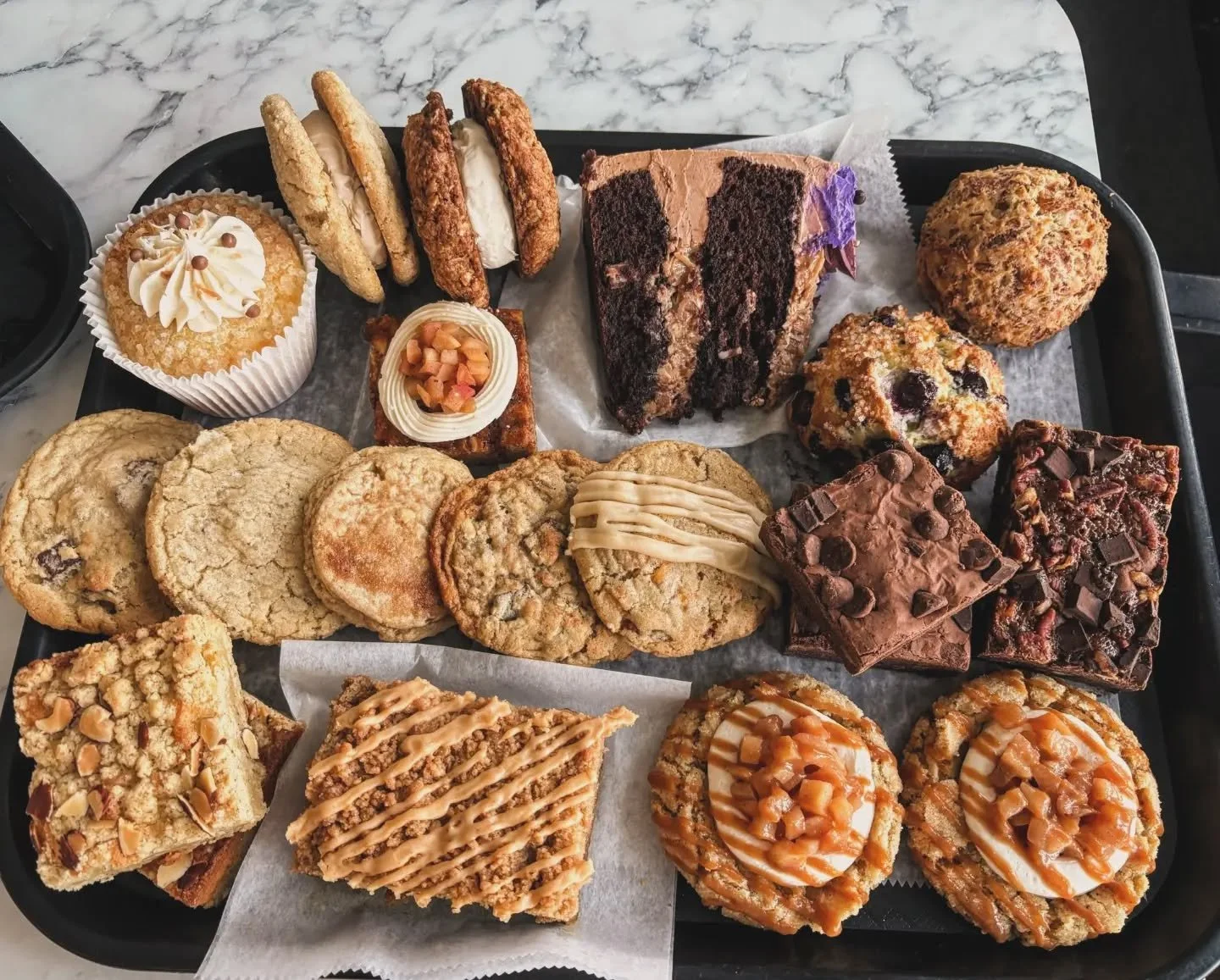 It's a great day for a box of baked goodies, here's what we've got waiting for you:

EXTRAS
- pumpkin coffee cake (will be on Thanksgiving menu!)
- caramel apple cheesecake filled cookies
- almond croissant bar
- chocolate coconut cakelet 
- German c