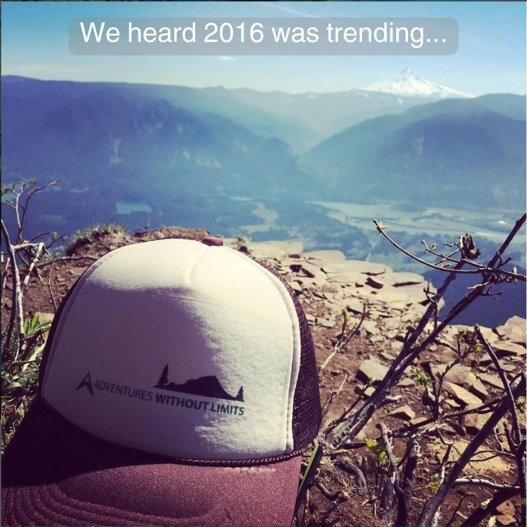 We heard 2016 was trending! Whether it's 2016 or 2026, you can still find Adventures Without Limits building community and getting outdoors all year round!

Image Descriptions: 1) A hat with an old A-W-L logo artfully placed on the ground with a scen