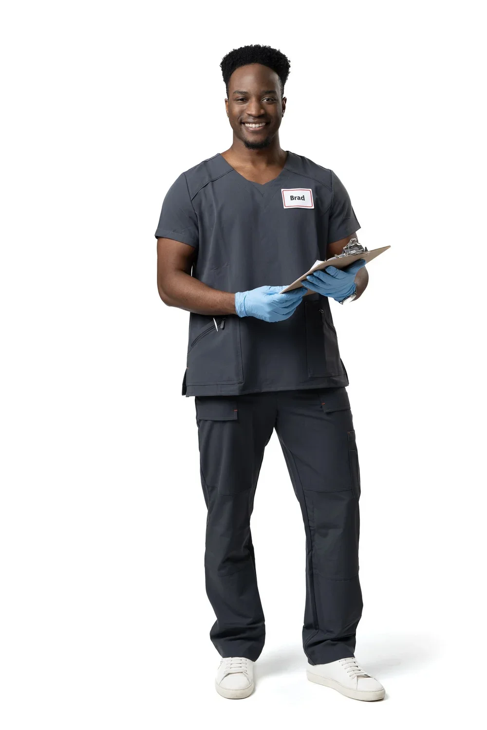 Male nurse holding a clip board. White studio background.  