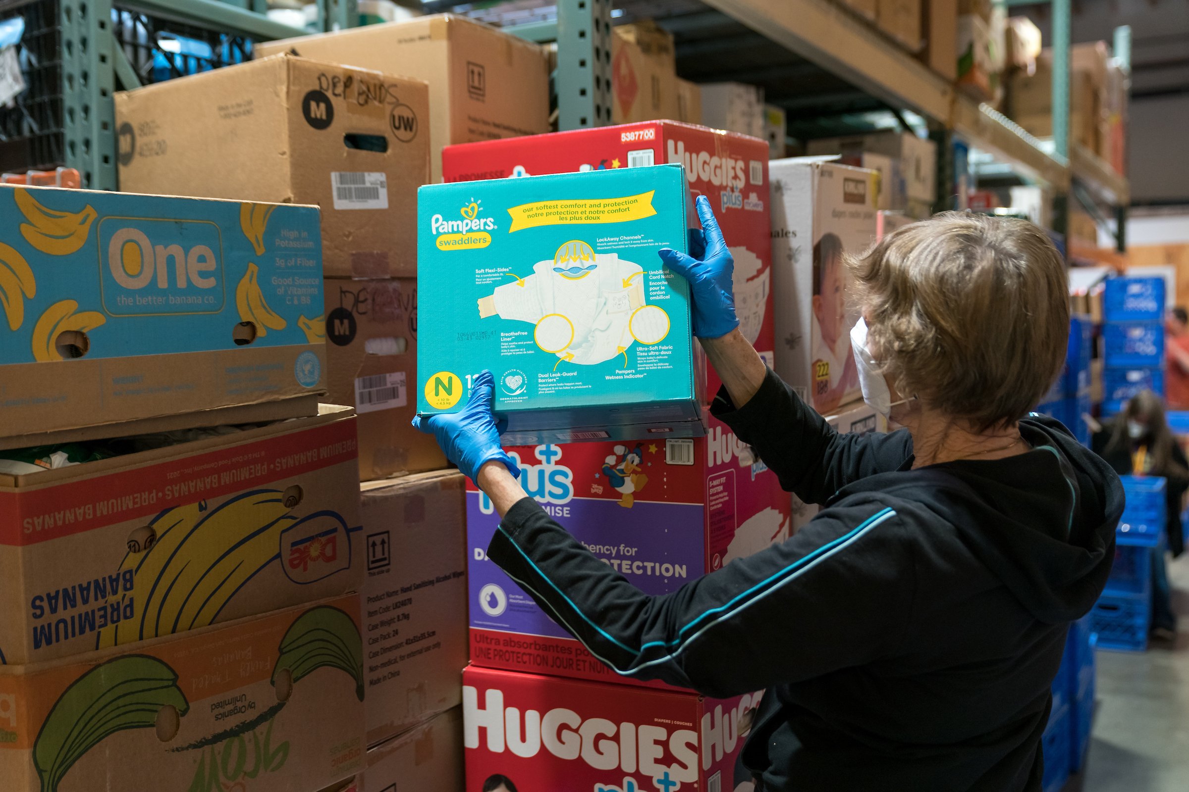 Ballard food bank volunteer sorting diapers.jpg