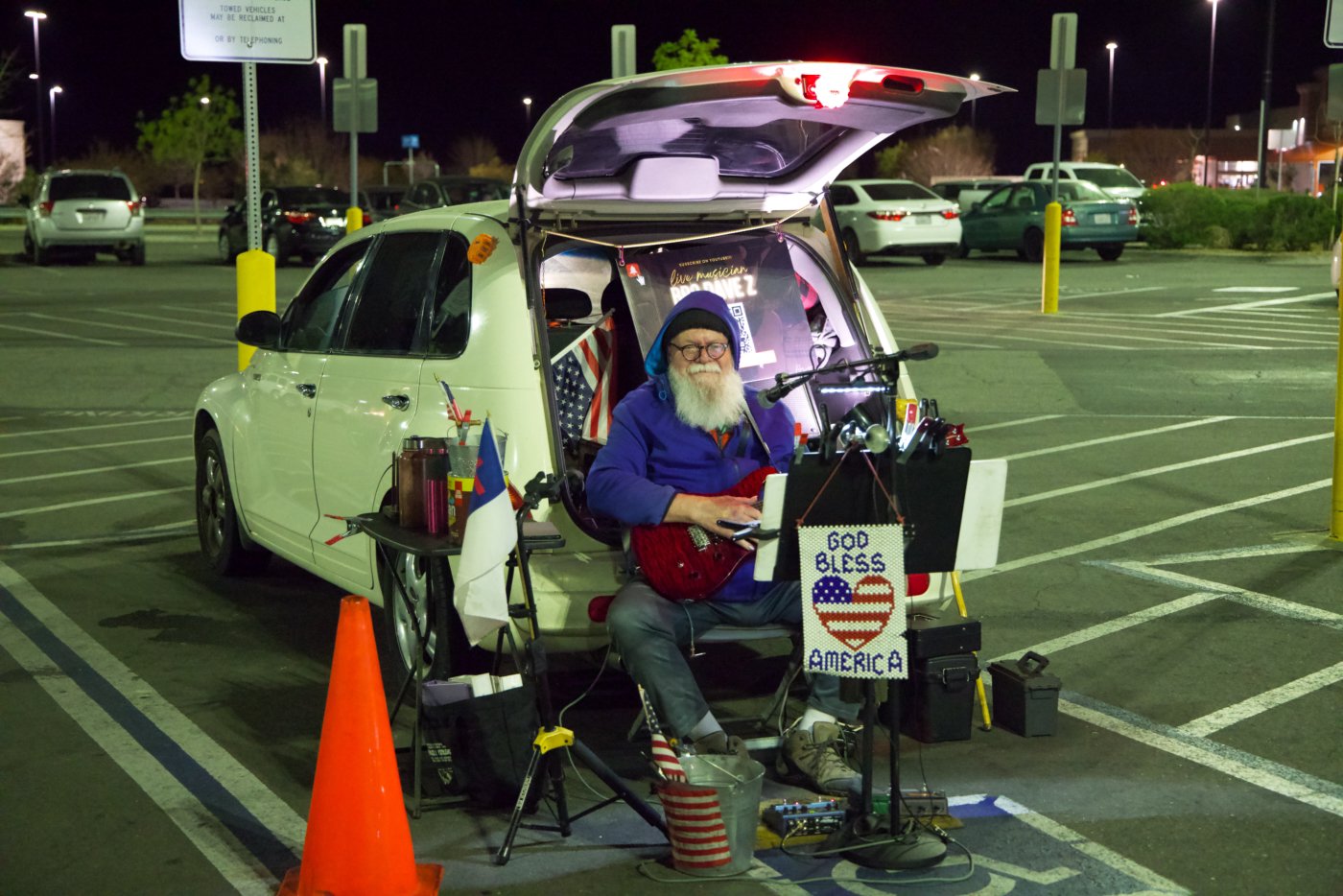 Musician playing for tips at Walmart Super Center, Borrego Springs 