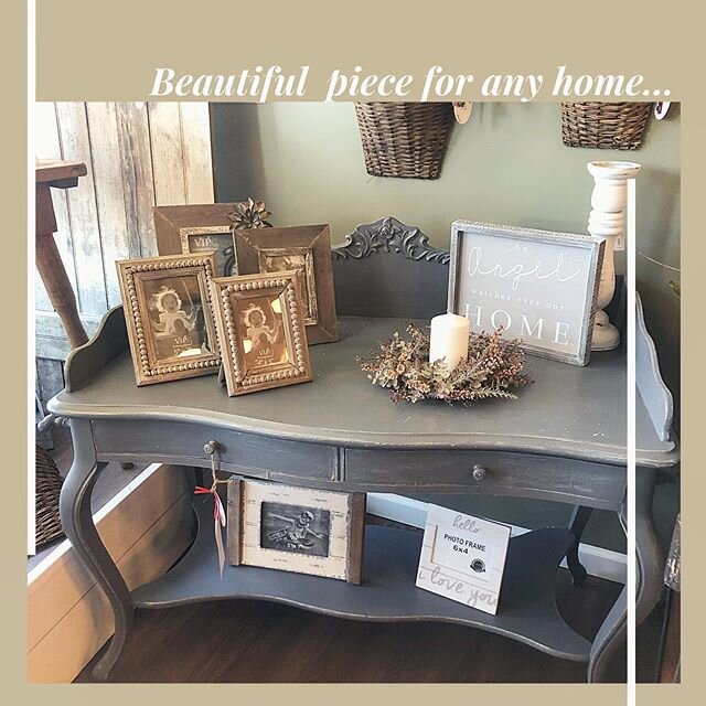 This gray table has two drawer storage and beautiful accents along the top that let its true character shine through. This is perfect for displaying your favorite photos or can be utilized as a desk. Come see this perfect pick on Thursday. Open from 