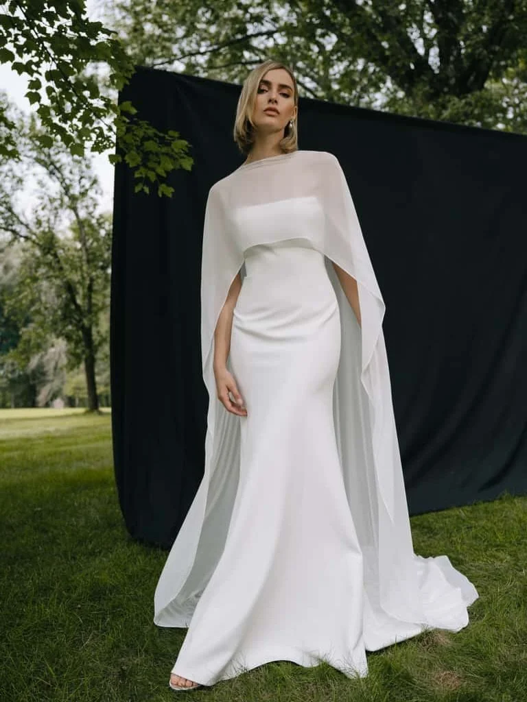 Toppers and capes are one of our favorite ways to transform a gown. They add texture, softness, drama, or just a little something extra.

Whether you&rsquo;re dreaming of a ceremony moment that feels timeless and romantic, then a reception look that&