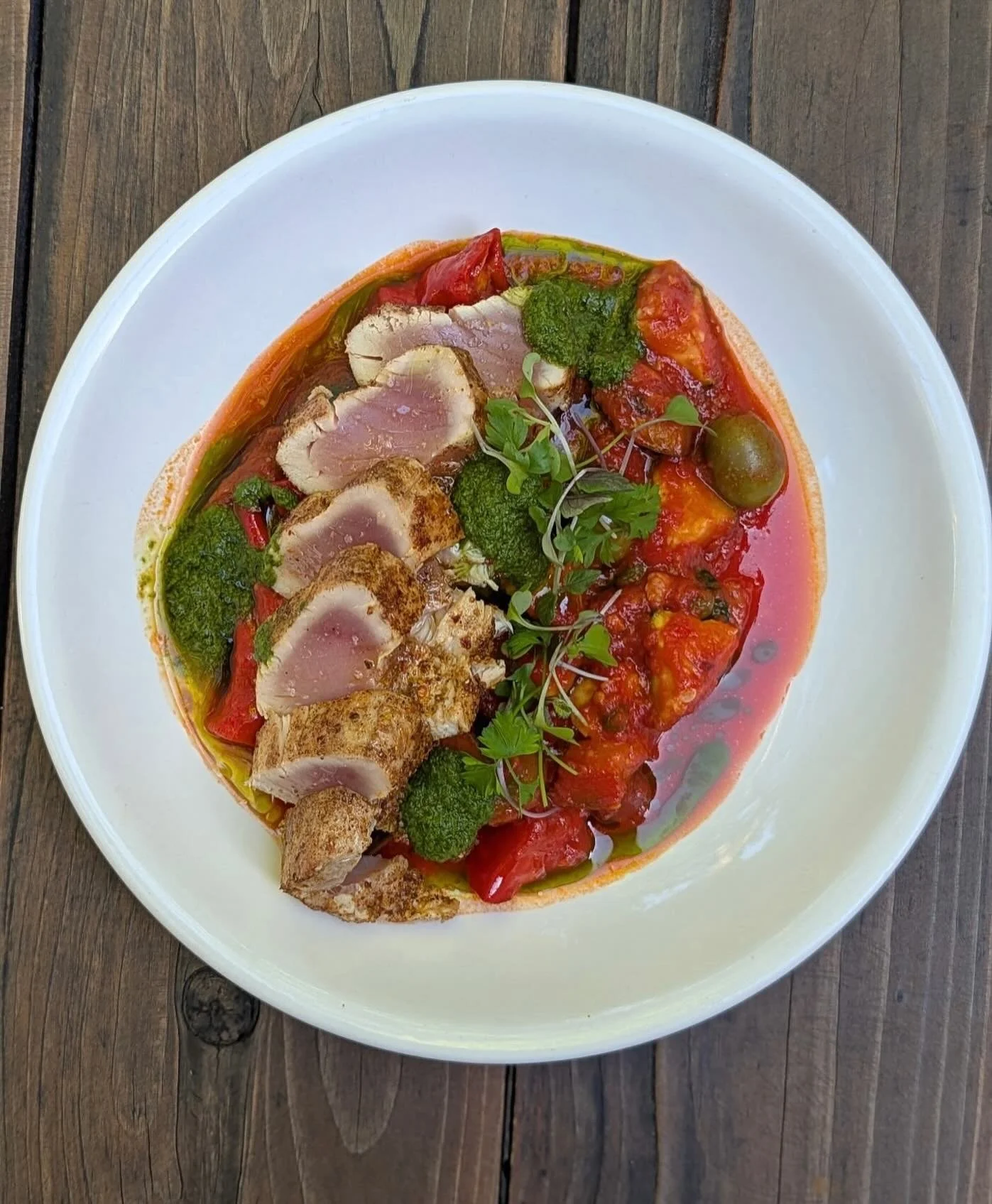 New Dish! Seared Albacore Tuna with a summer stew of tomato, jimmy nardellos, squash, eggplant and olives - basically it&rsquo;s ciambotta, which is Italian ratatouille, and some salsa verde. We&rsquo;re holding on tight to summer while we can becaus