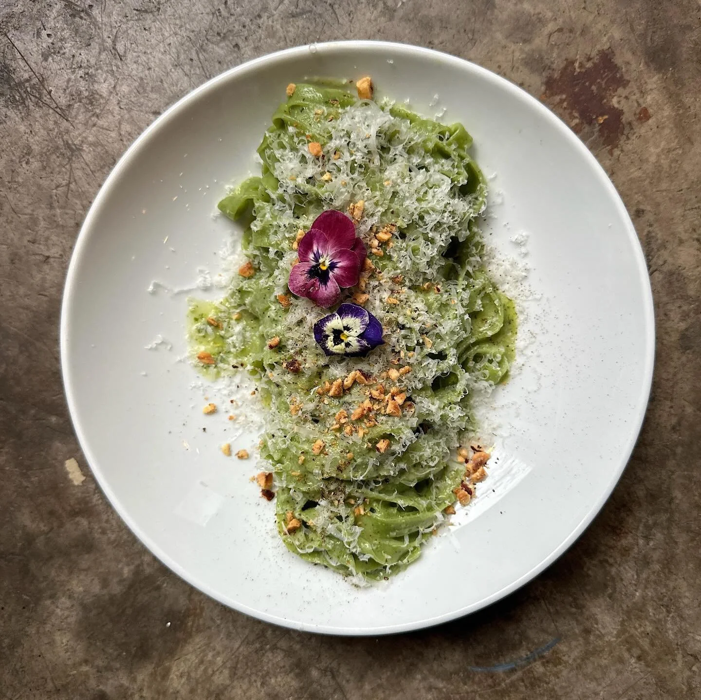 We&rsquo;re pushing the spring agenda a bit, but I&rsquo;m excited to have our pasta al pesto back on the menu! Tagliatelle made green with spinach and our basil-hazelnut pesto finished with really nice aged parmigiano make this one of my all time fa