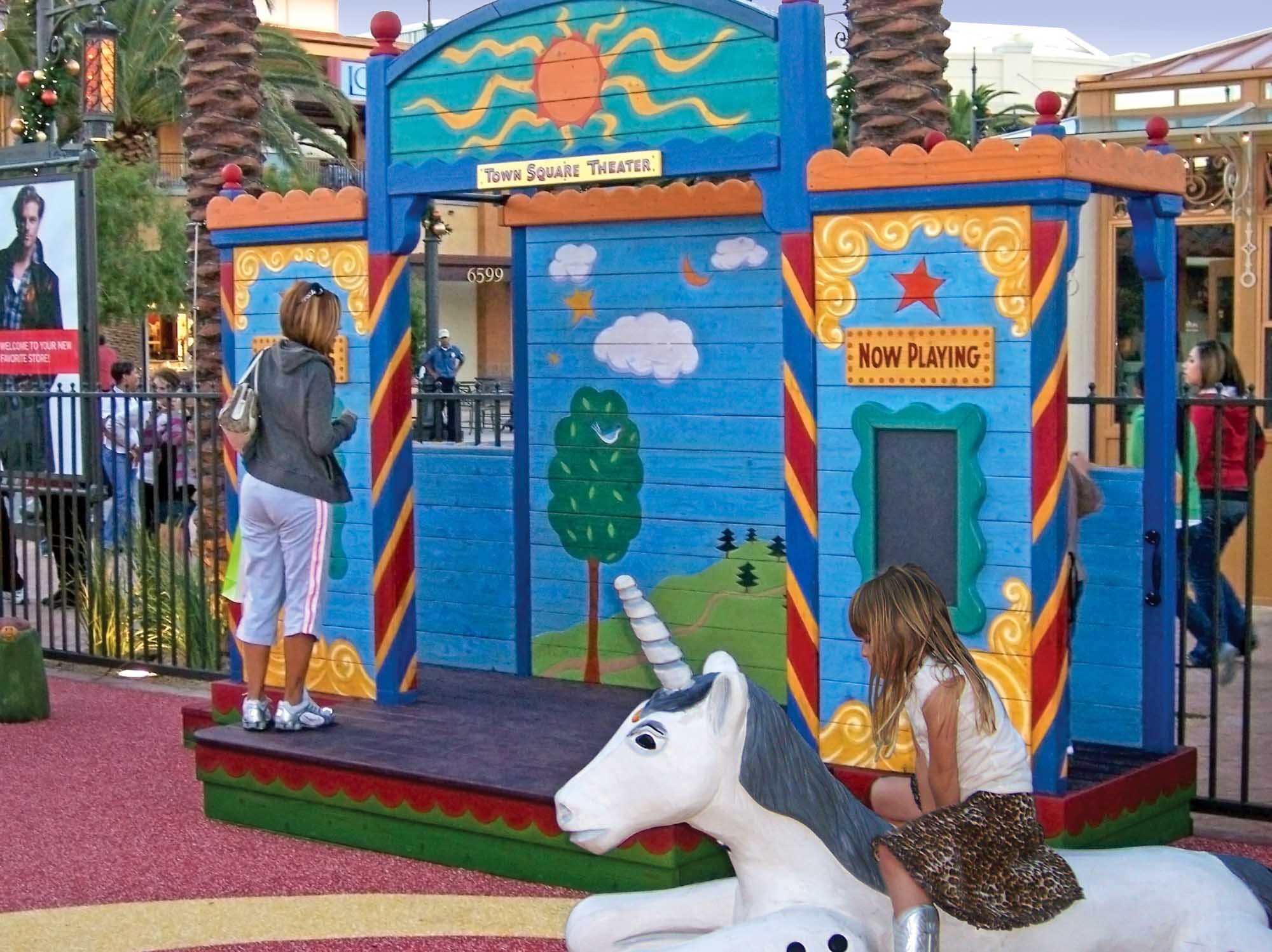  Sunbrella Theater curtains with tie-back tassels add to the fun and kids of all ages will enjoy the magic of the Town Square Theater. 