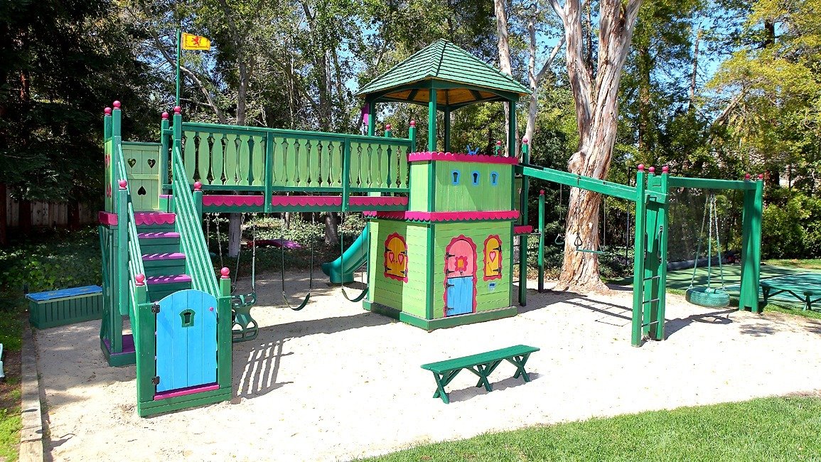 Bright and cheery, this play structure is beloved by all!

With colorful details and a myriad of play features, all who visit are sure to enjoy. So hop on and stay awhile!

#playfort #kidsplayfort #kidsport #colorfulfort #girlsfort #backyardfort #cus