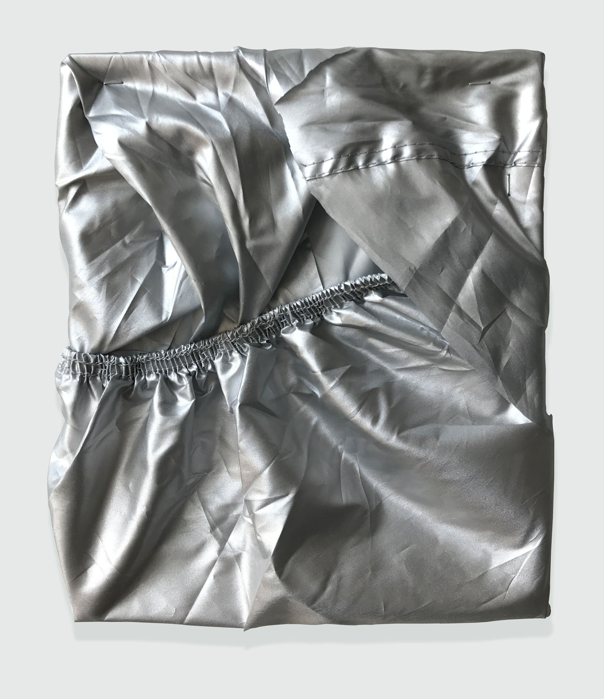  Laura Hunt,  Untitled , 2019, metallic motocycle cover, 12 x 10 inches (edges variable). 