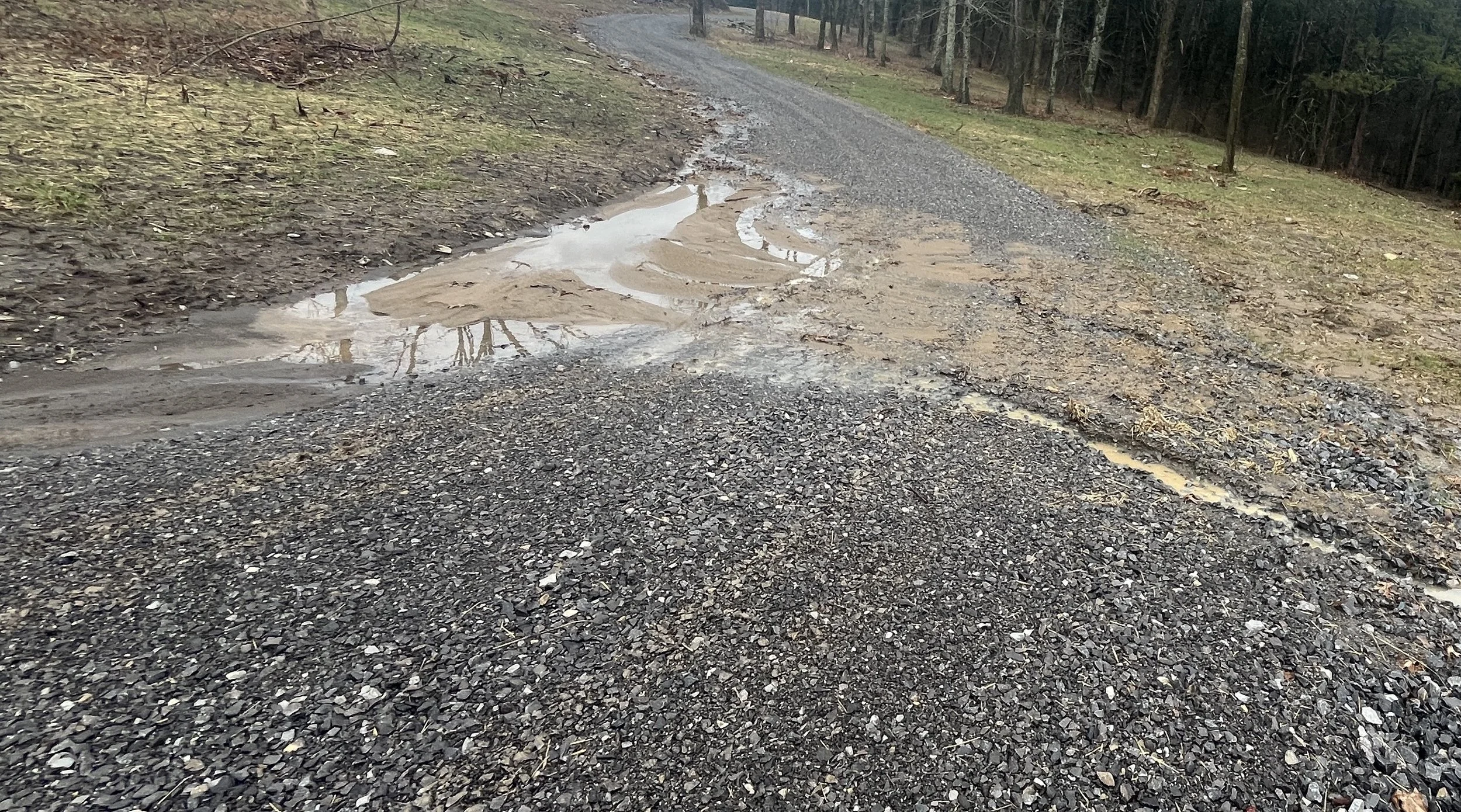 Washed out gravel driveway on rural farm in TN