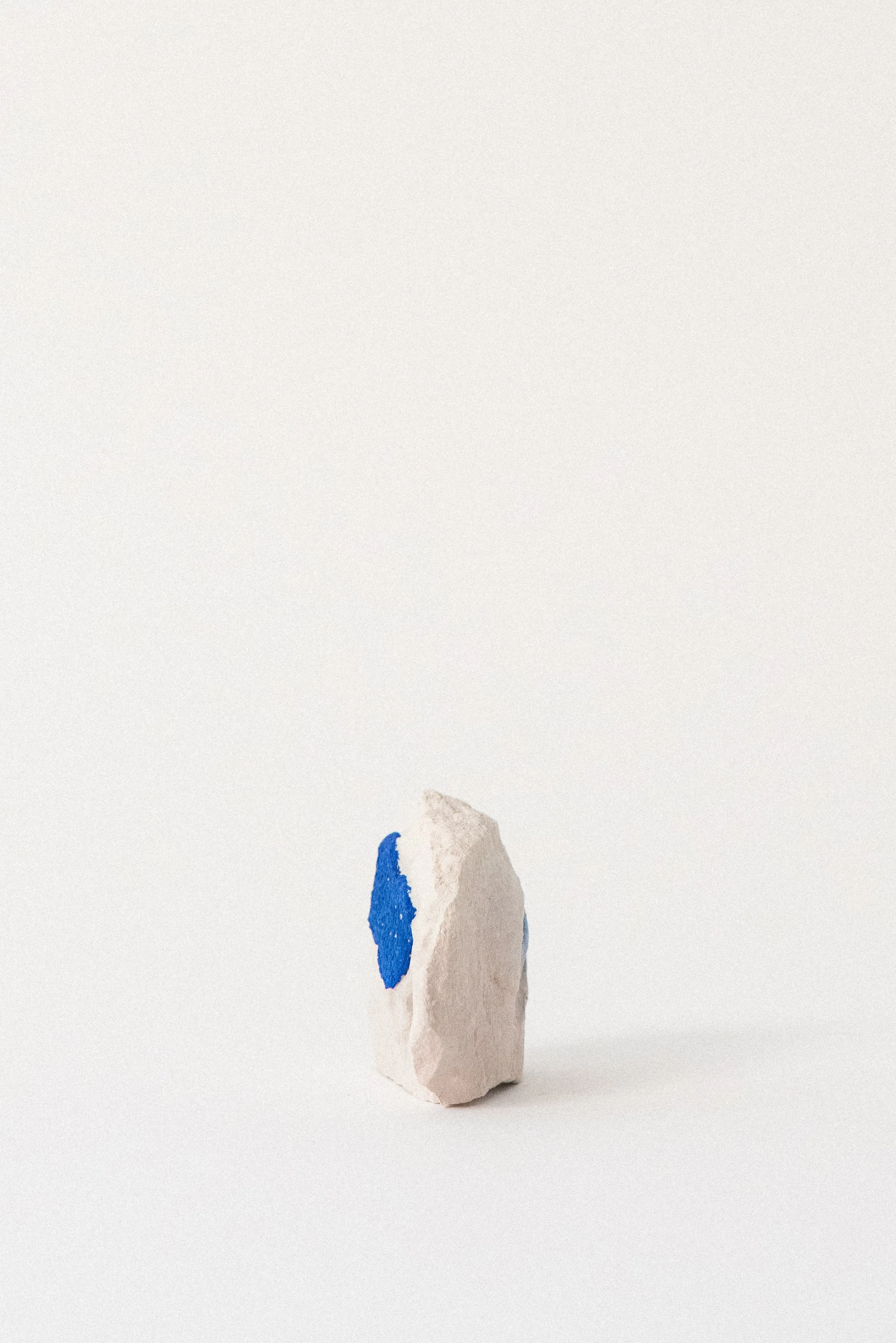 Tall vertical specimen with bright blue azurite sun on pale clay matrix, sourced from Malbunka Copper Mine in the Northern Territory of Australia.