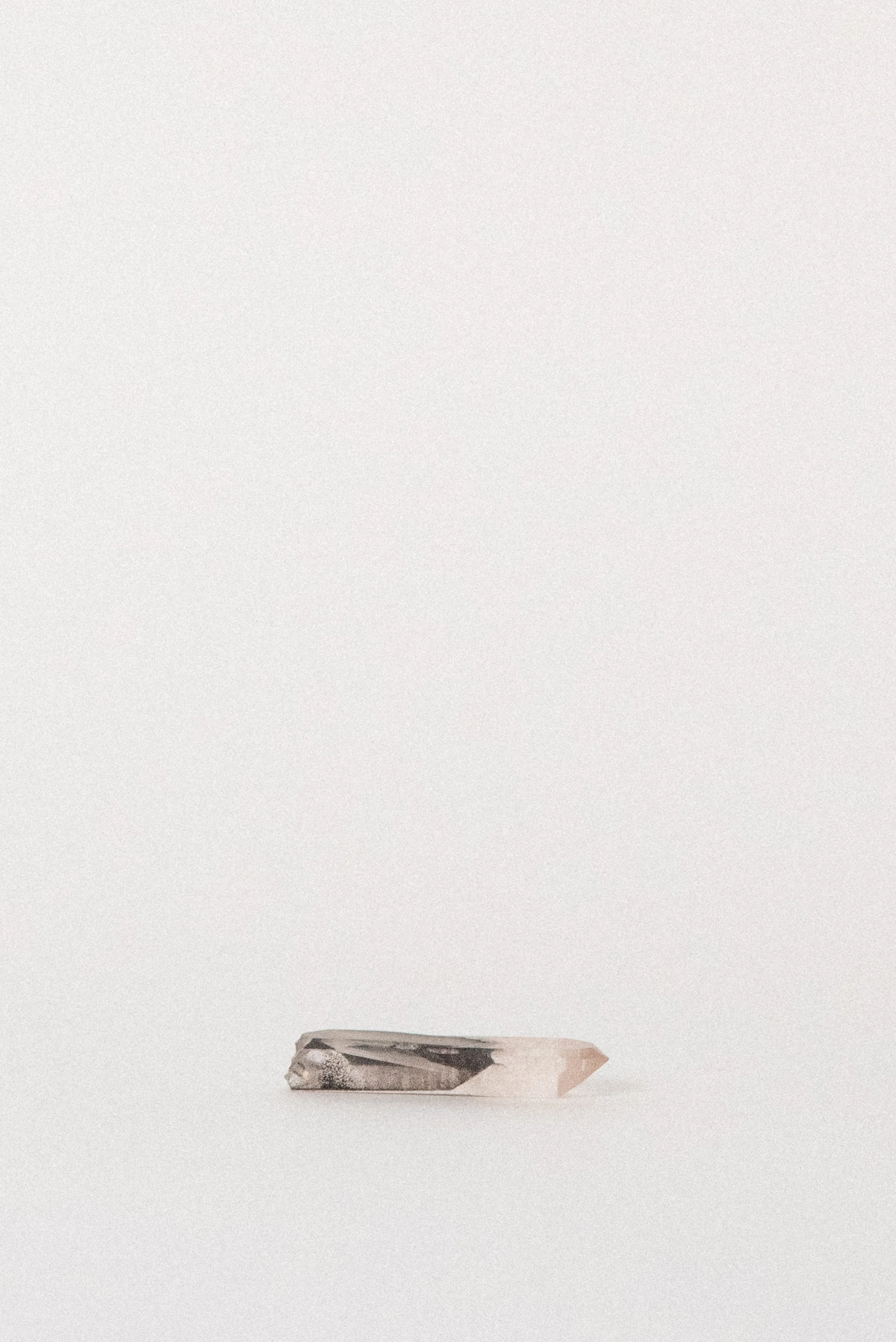 crystal-voyager-quartz-point-with-hematite-karur-india-3.jpg