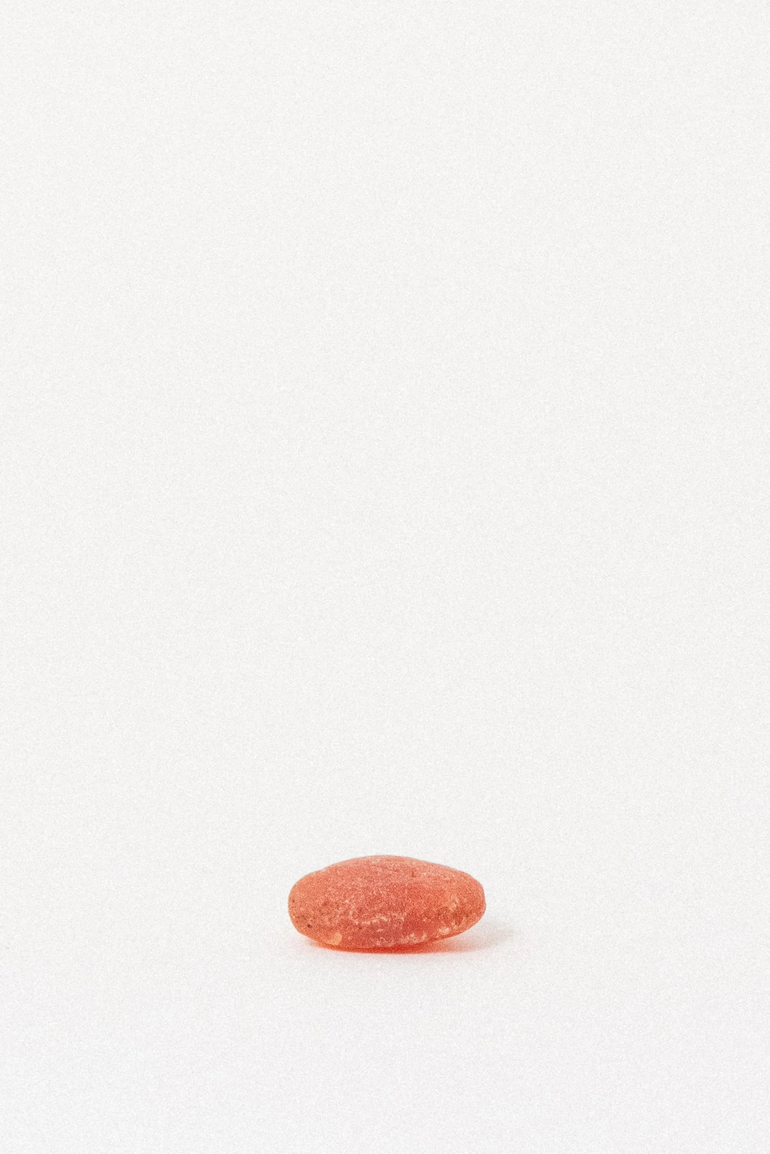 Flat view of natural African Carnelian crystal with raw texture
