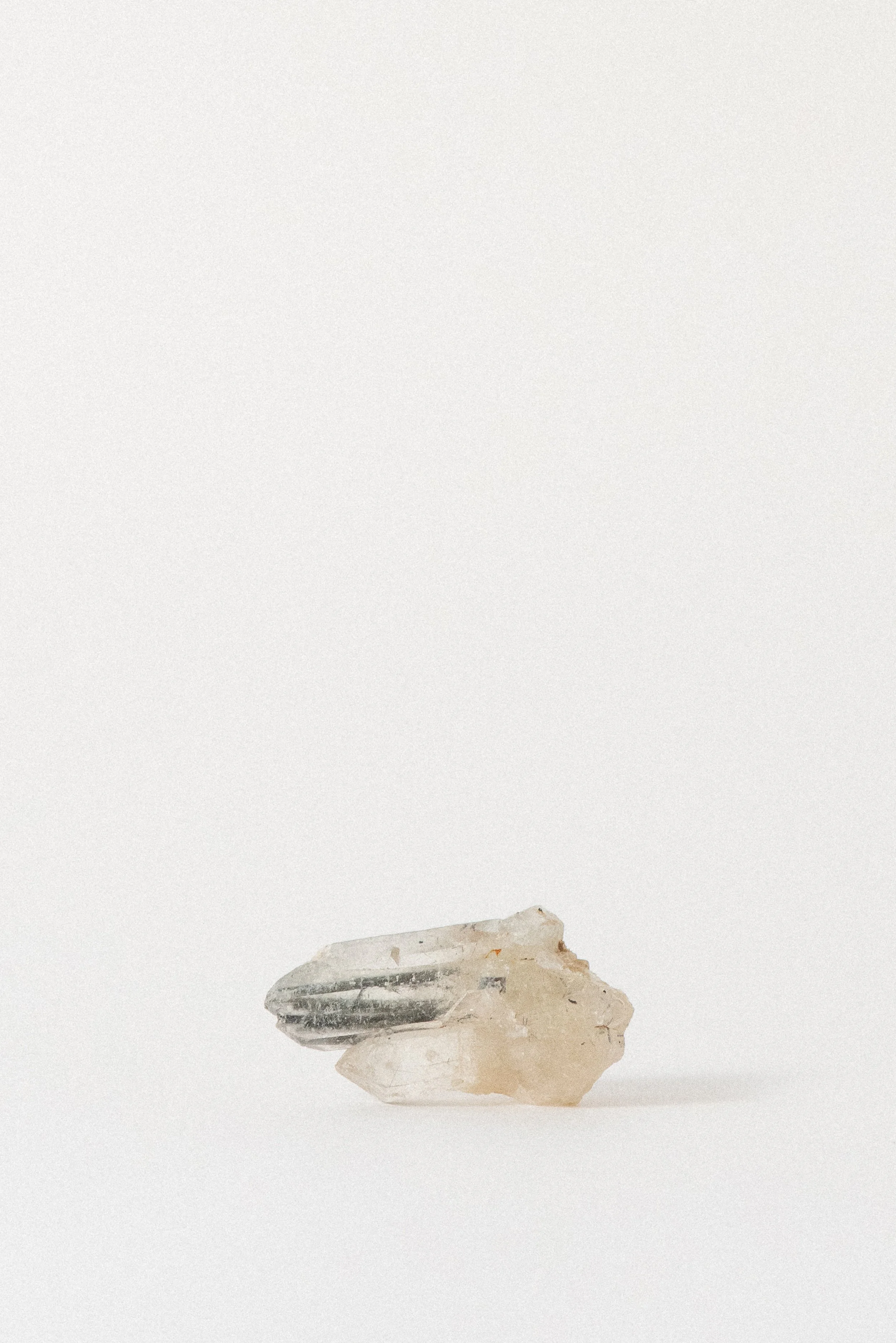 shot of black tourmaline needles within quartz—symbol of protection and amplification.