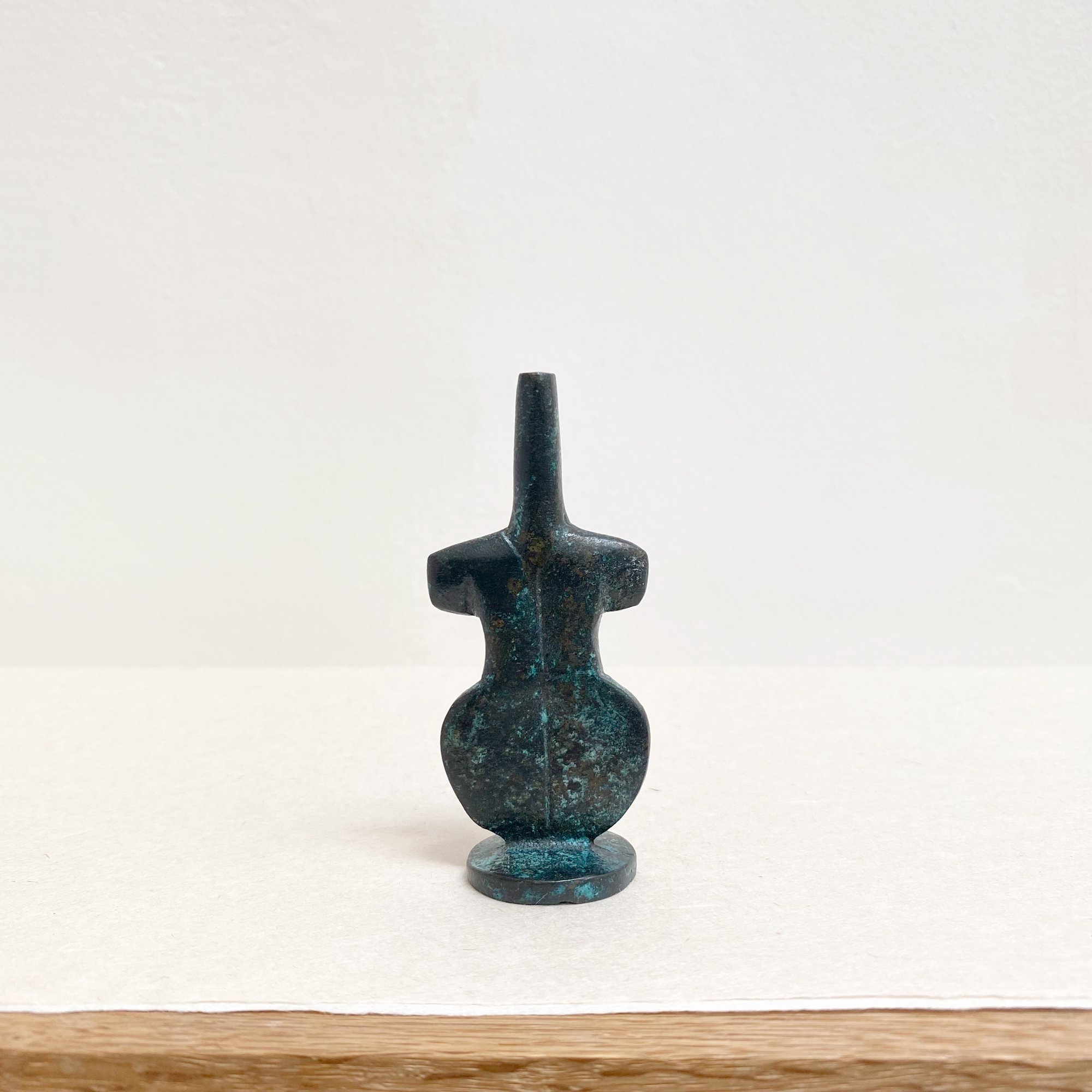 Crystal Voyager Small iron figurine with a verdigris patina, c. mid-century