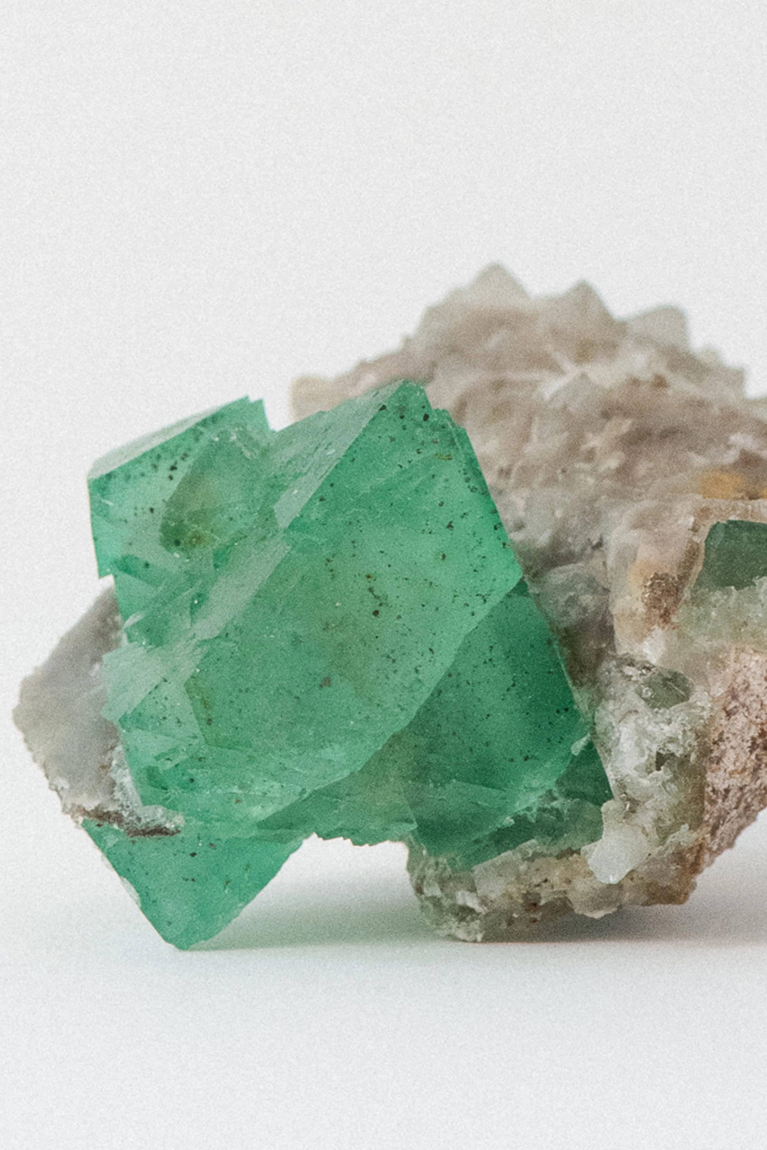 Sharp green fluorite crystals from Erongo, displayed on quartz