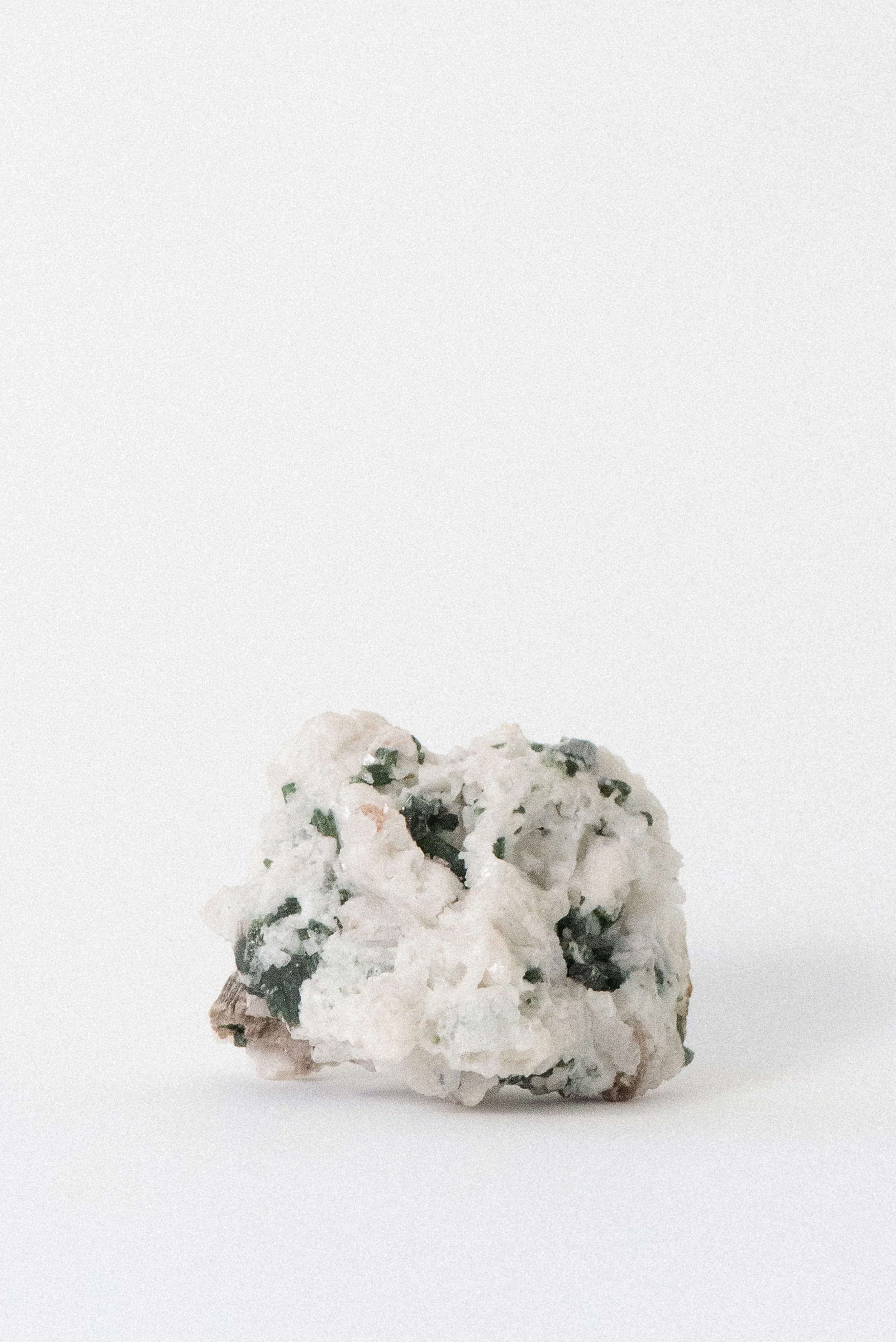 Crystal-Voyager-albite-with-green-tourmaline-brazil-1.jpg