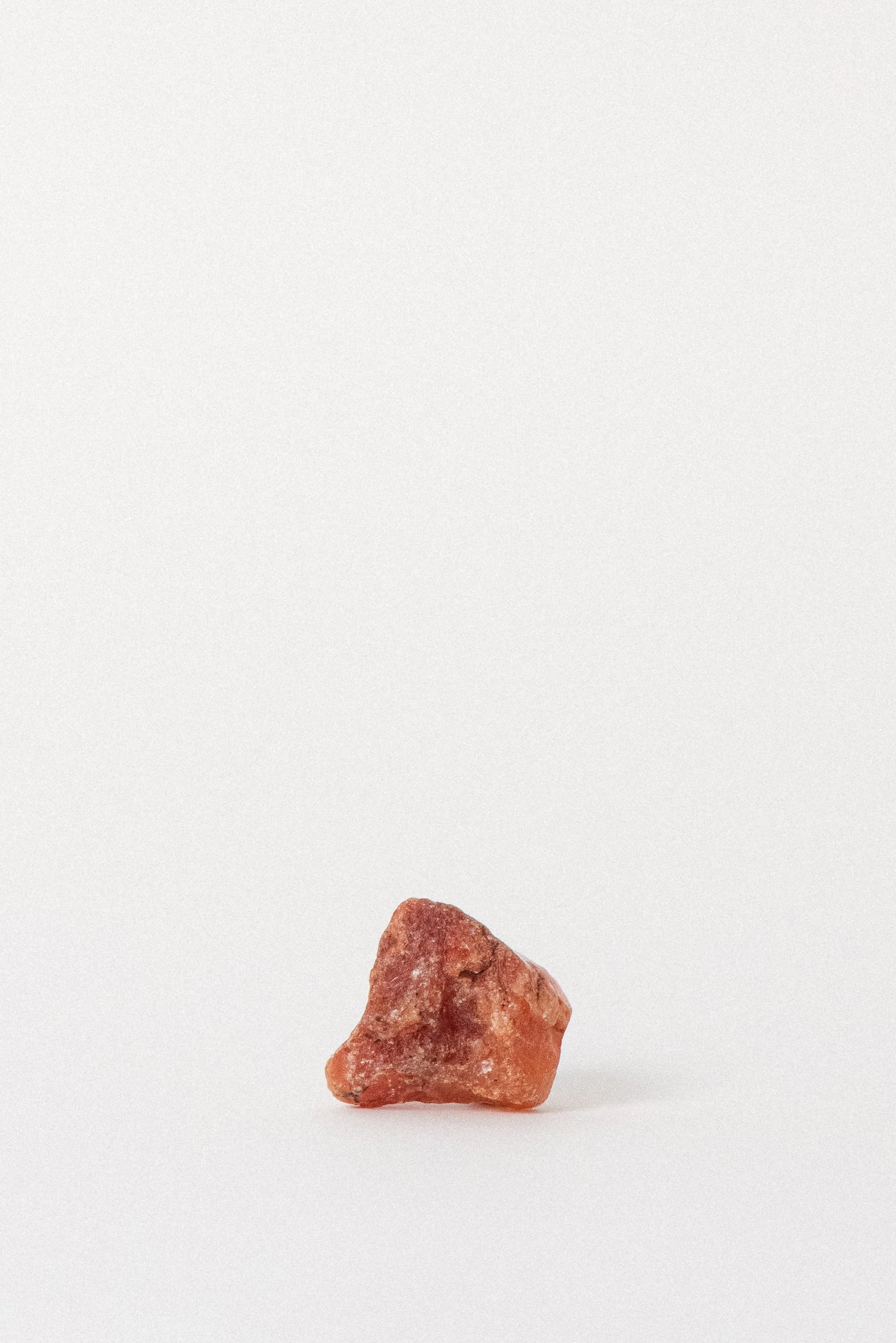 Side angle of African Carnelian highlighting rich ochre and rust tones.