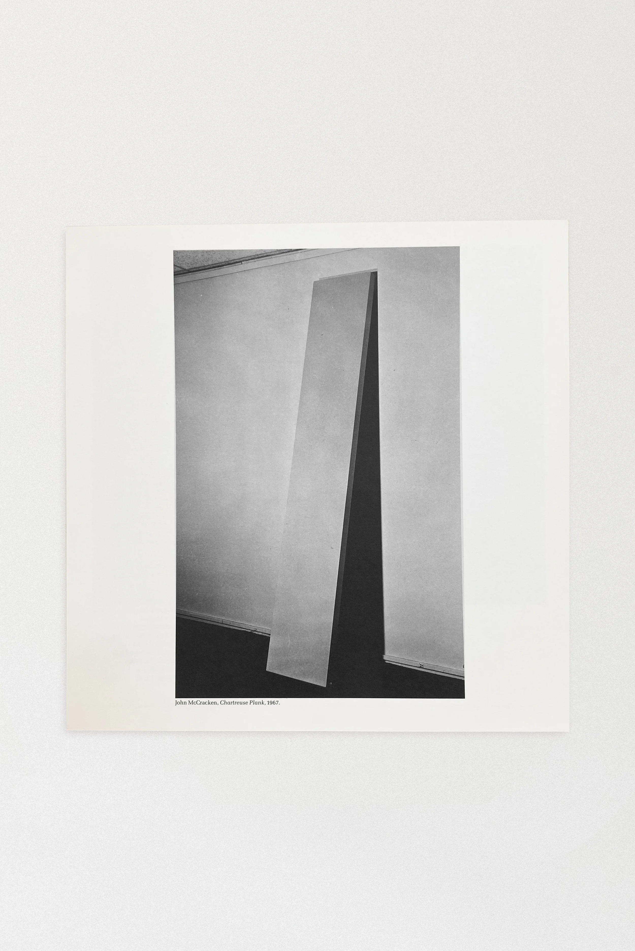Black and white image of John McCracken’s 1967 sculpture Chantreuse Plank, featured in the West Coast: 1945–1969 exhibition catalog published by the Pasadena Art Museum.