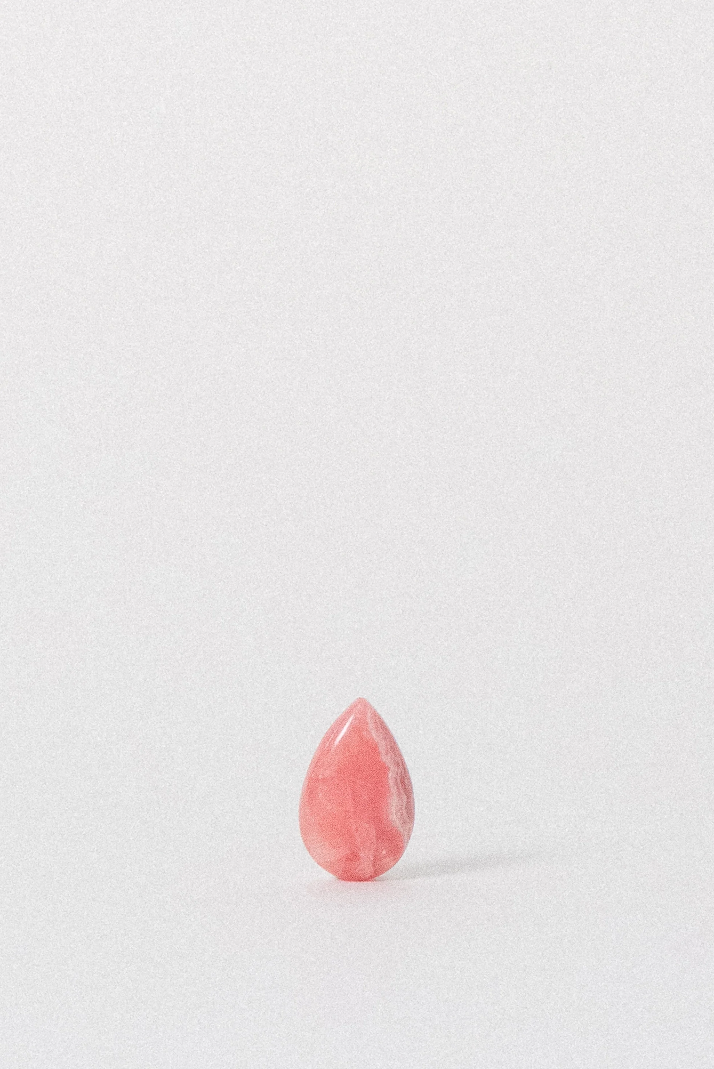 crystal-voyager-gem-rhodochrosite-cabochon-argentina-1.jpg
