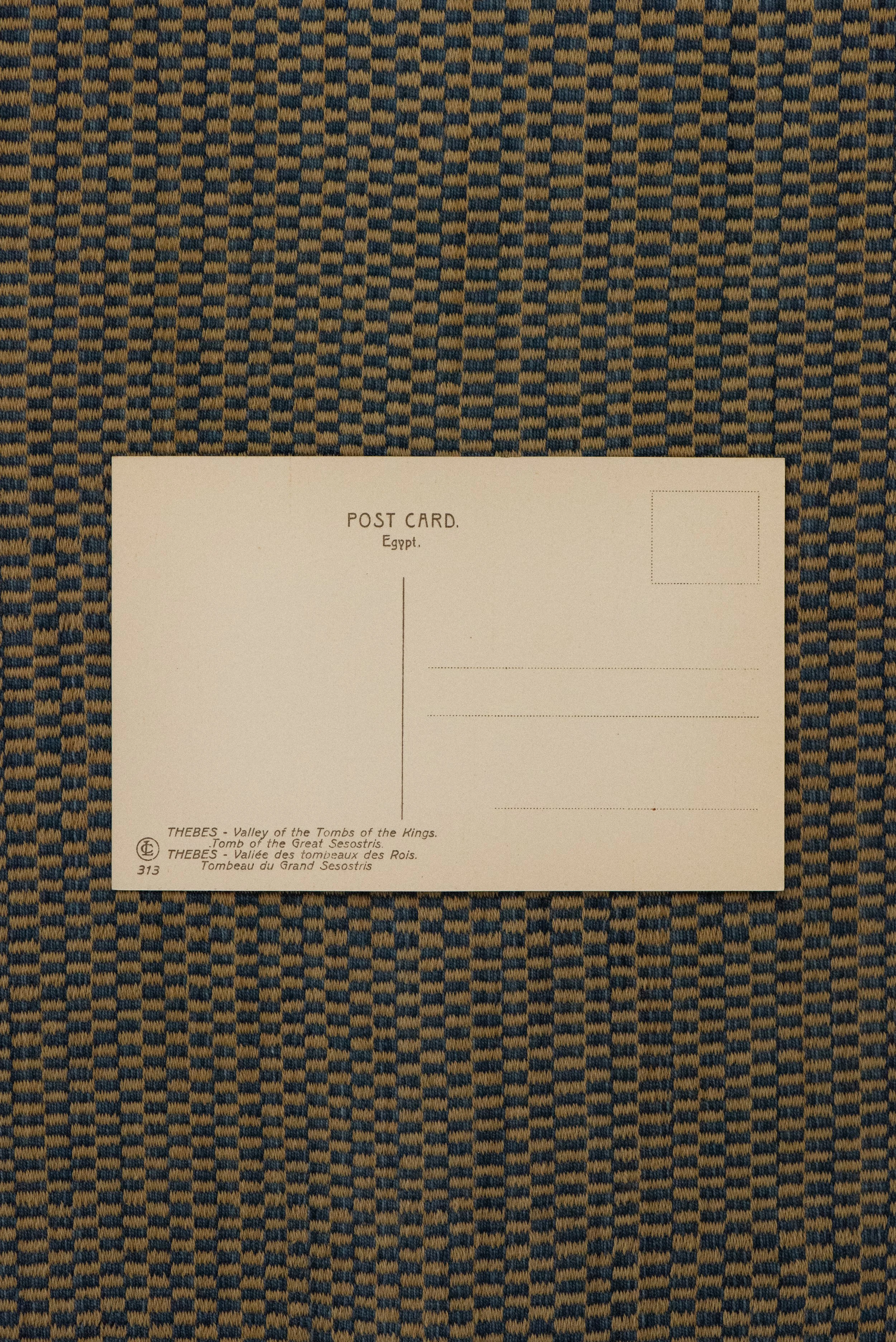 Back of vintage Egyptian postcard with space for address, marked Valley of the Tombs of the Kings, Tomb of the Great Sesostris.