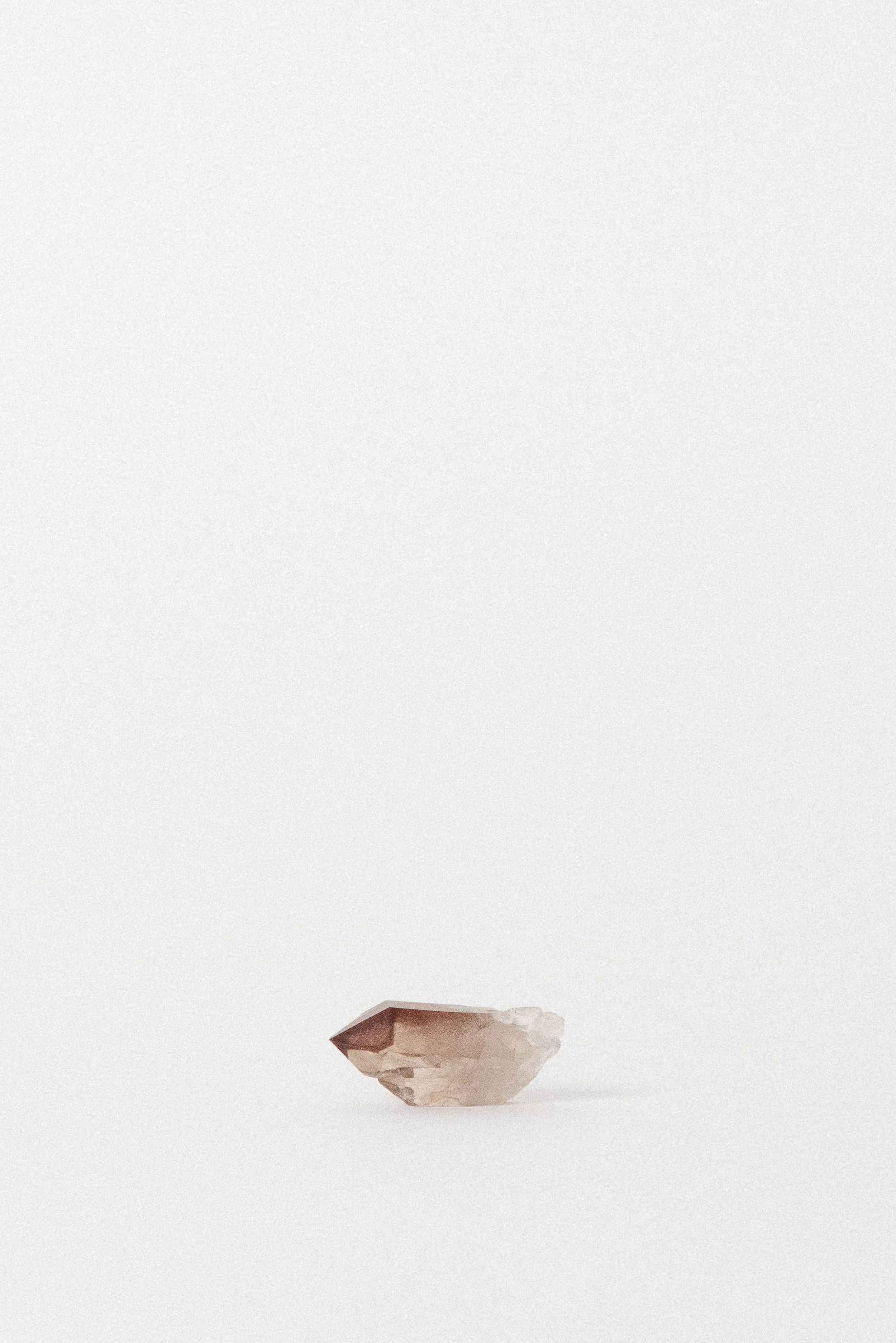 Ferruginous Red Quartz crystal point from Orange River, South Africa.
