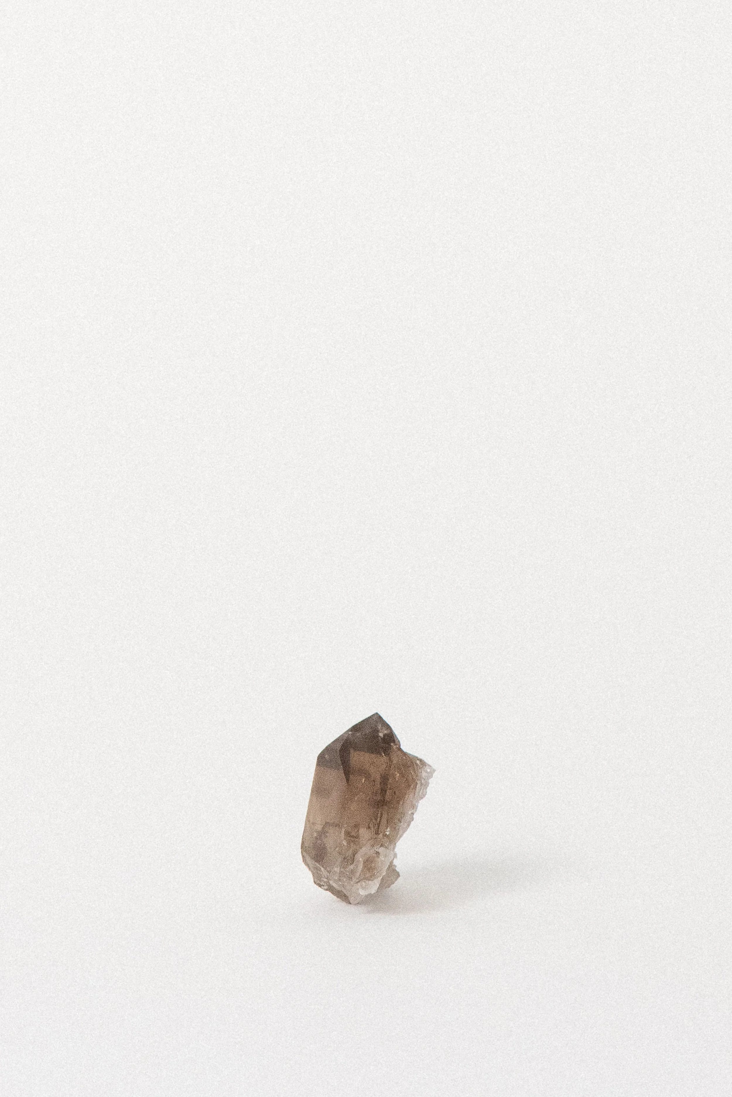 Rear view of smoky quartz with natural matrix growth, Mont Blanc region.