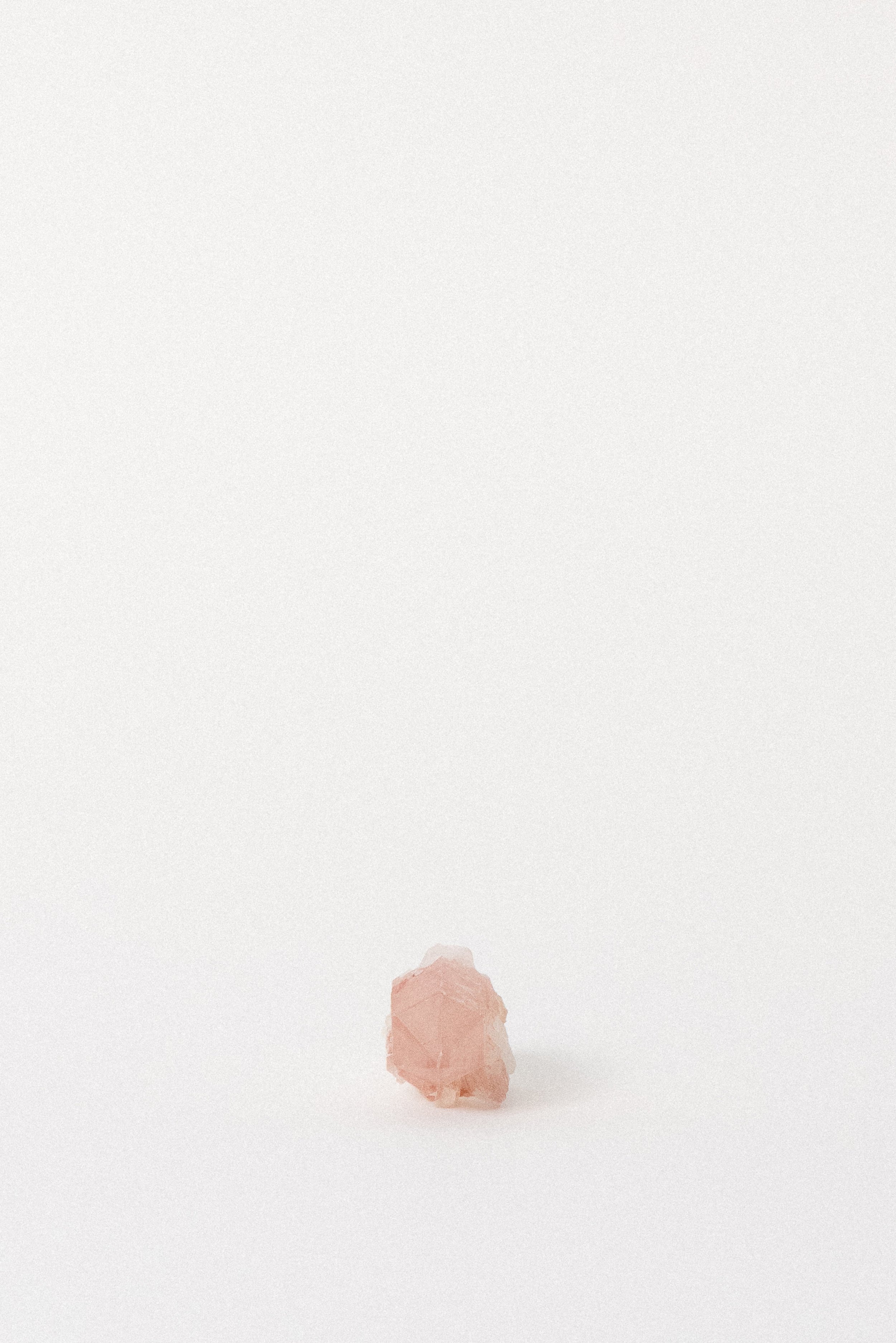Termination view of Pink Quartz showing hexagonal structure and rosy tone