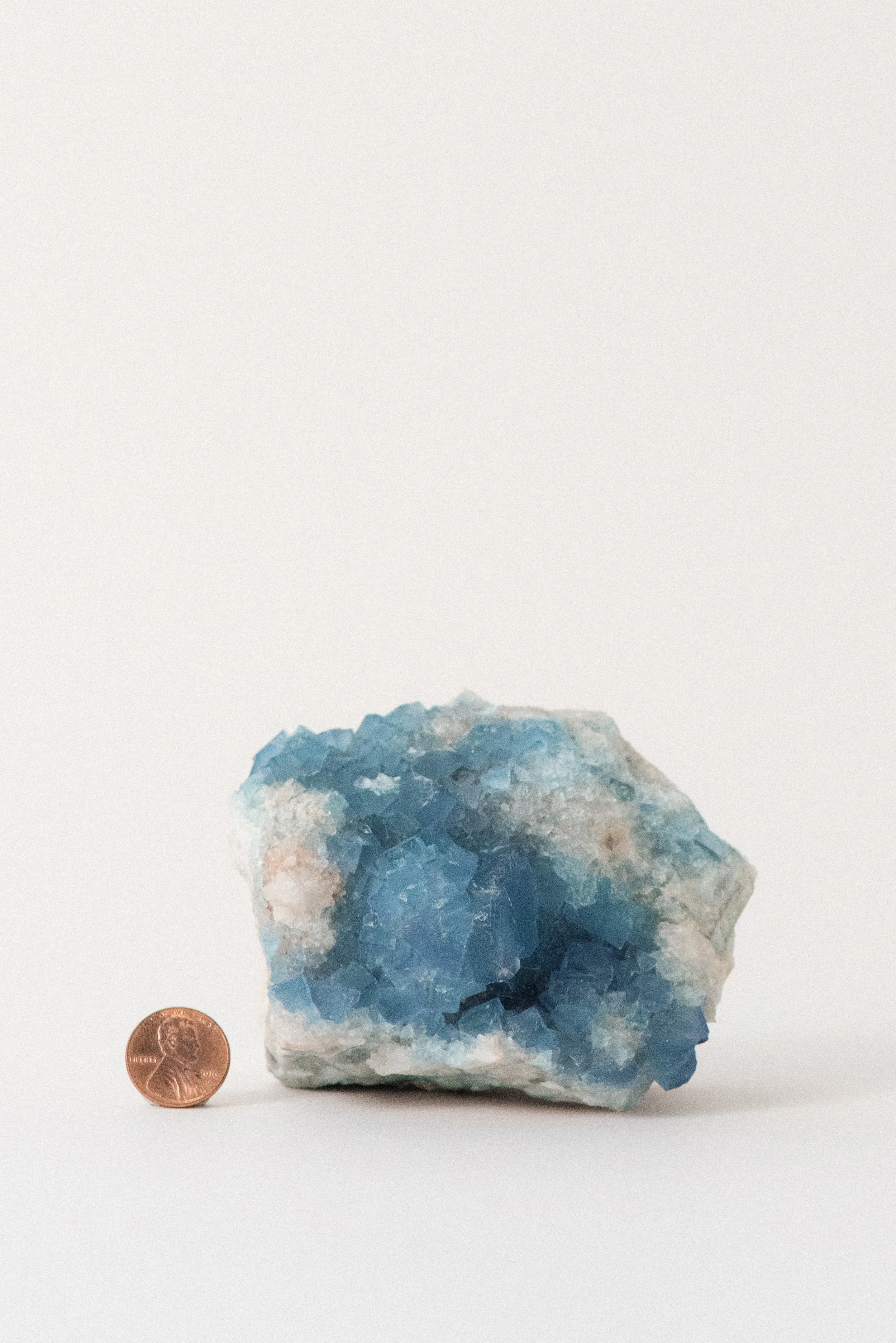 Blue cubic fluorite crystal cluster on matrix, from the Blanchard Mine in the Hansonburg District of New Mexico. Fine U.S. mineral specimen. Crystal Voyager.