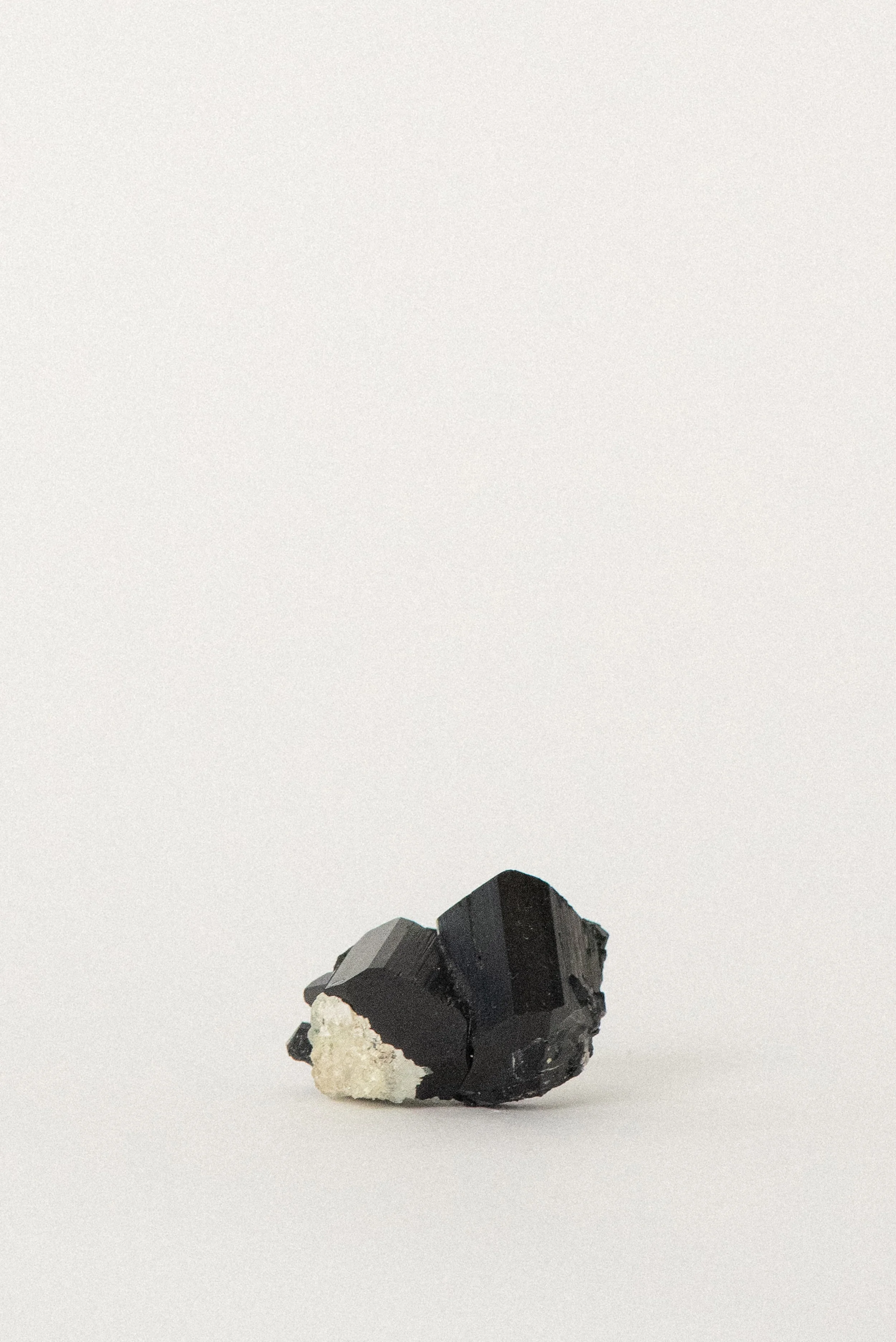 crystal-voyager-black-tourmaline-twins-feldspar-erongo-mountain-namibia-2.jpg