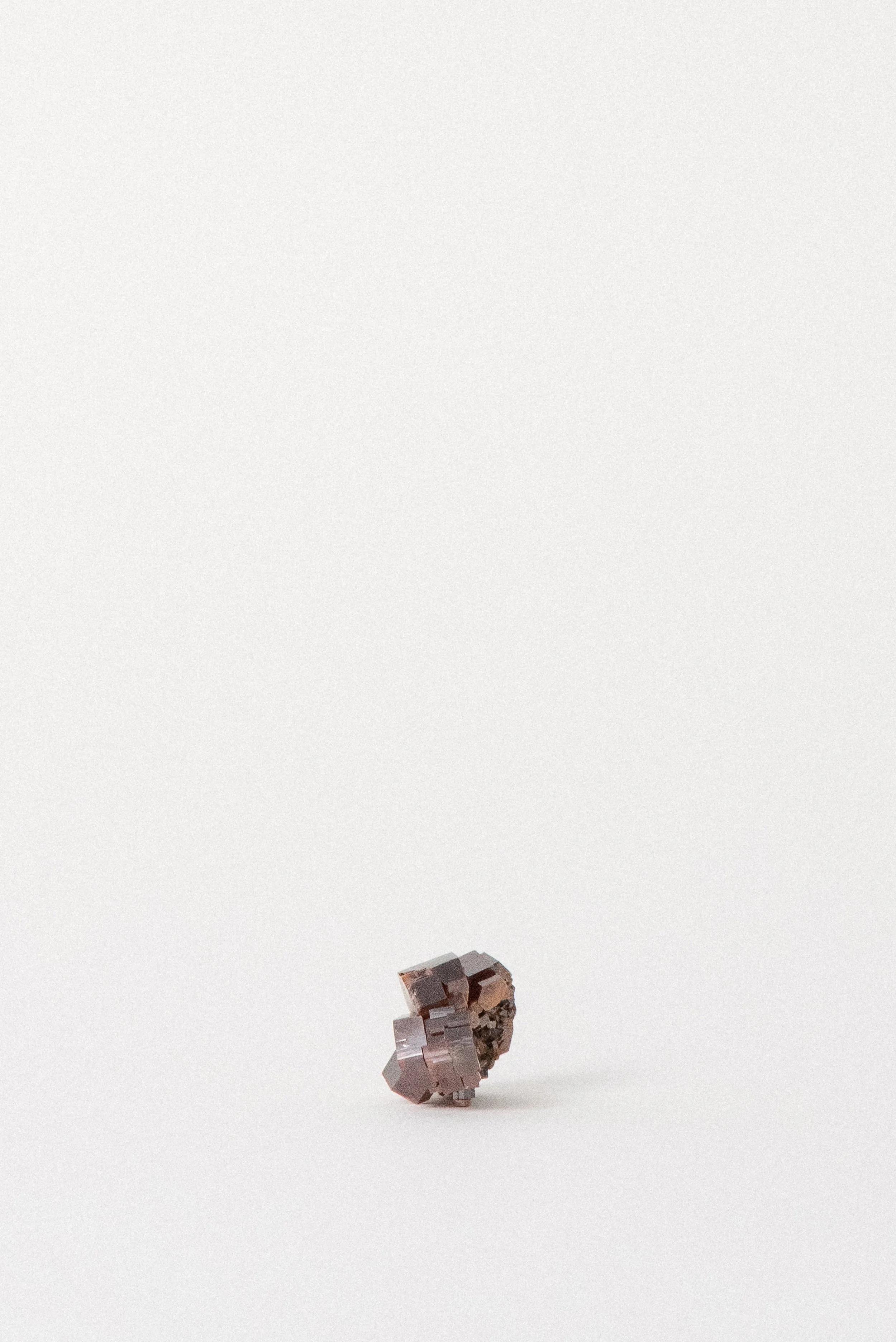 Vanadinite hexagonal crystals on host rock from Midelt Province, Morocco.