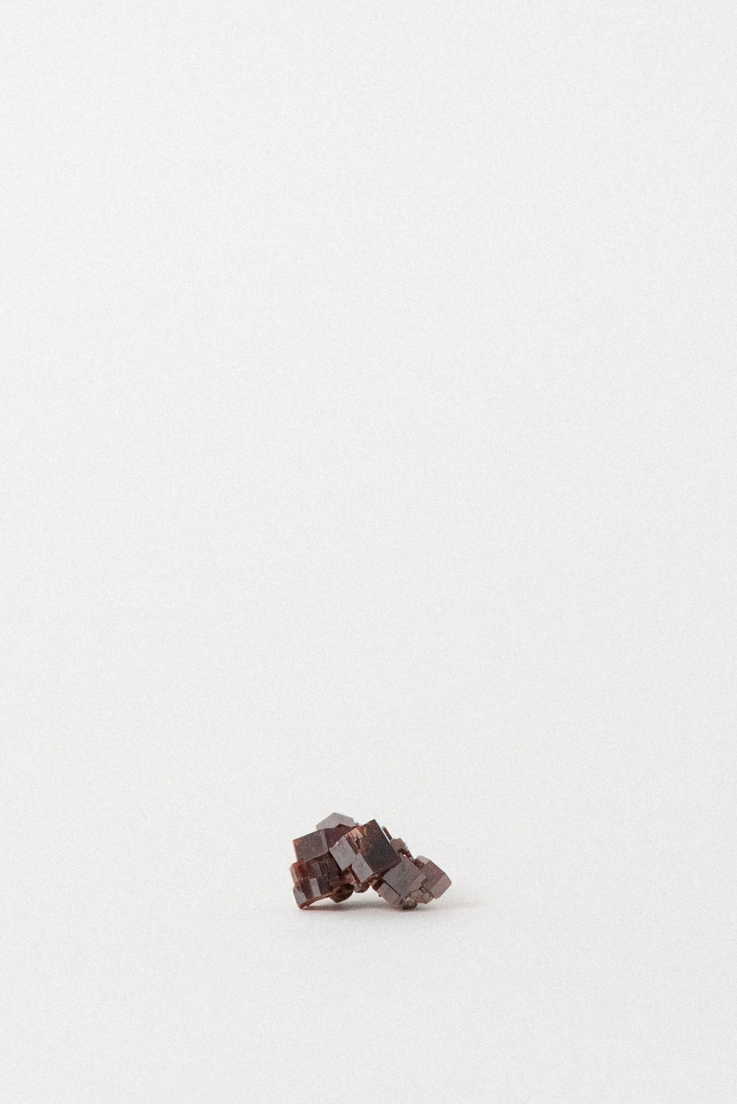 Upright Vanadinite specimen showing stacked crystal structure.