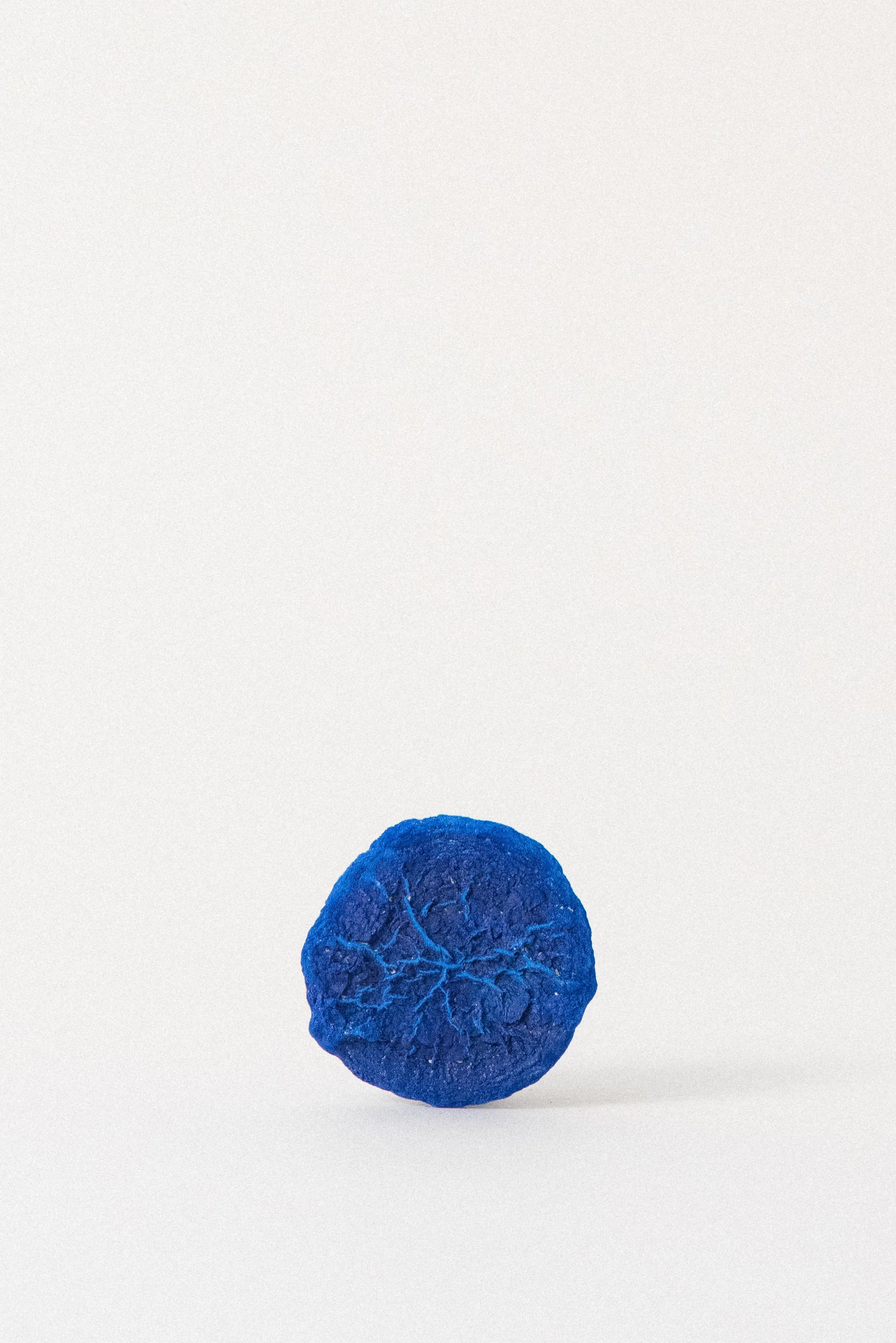 Deep blue azurite sun crystal specimen from the Malbunka Copper Mine in Australia, displayed upright without matrix on a white background.