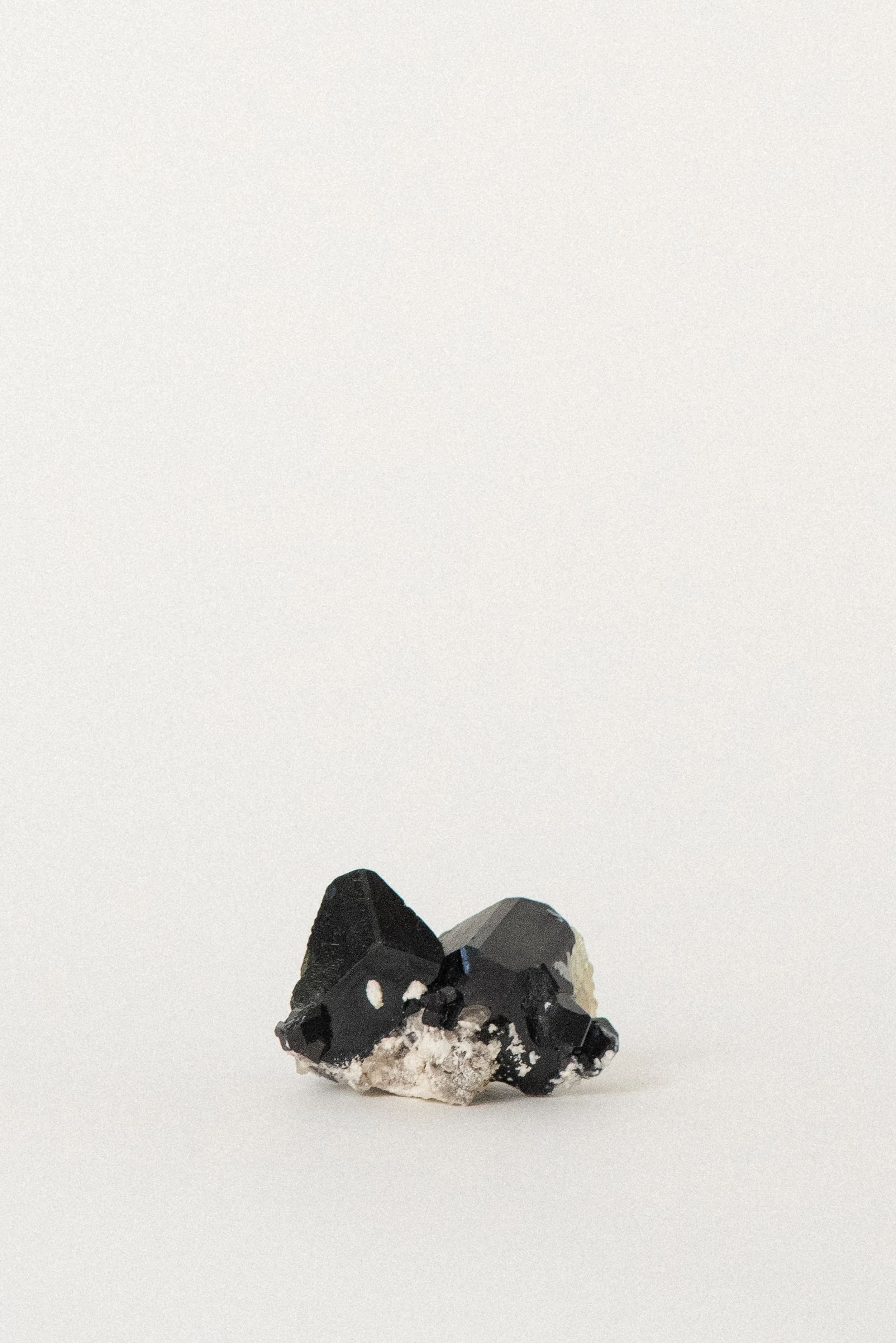 crystal-voyager-black-tourmaline-twins-feldspar-erongo-mountain-namibia-1.jpg