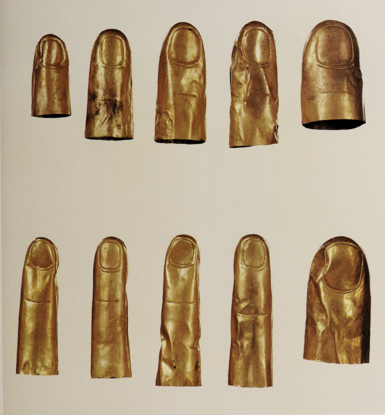 Gold Sheaths used to cover the finger and toe tips of King Tut, "Gold of Tutankhamen", c. 1978.