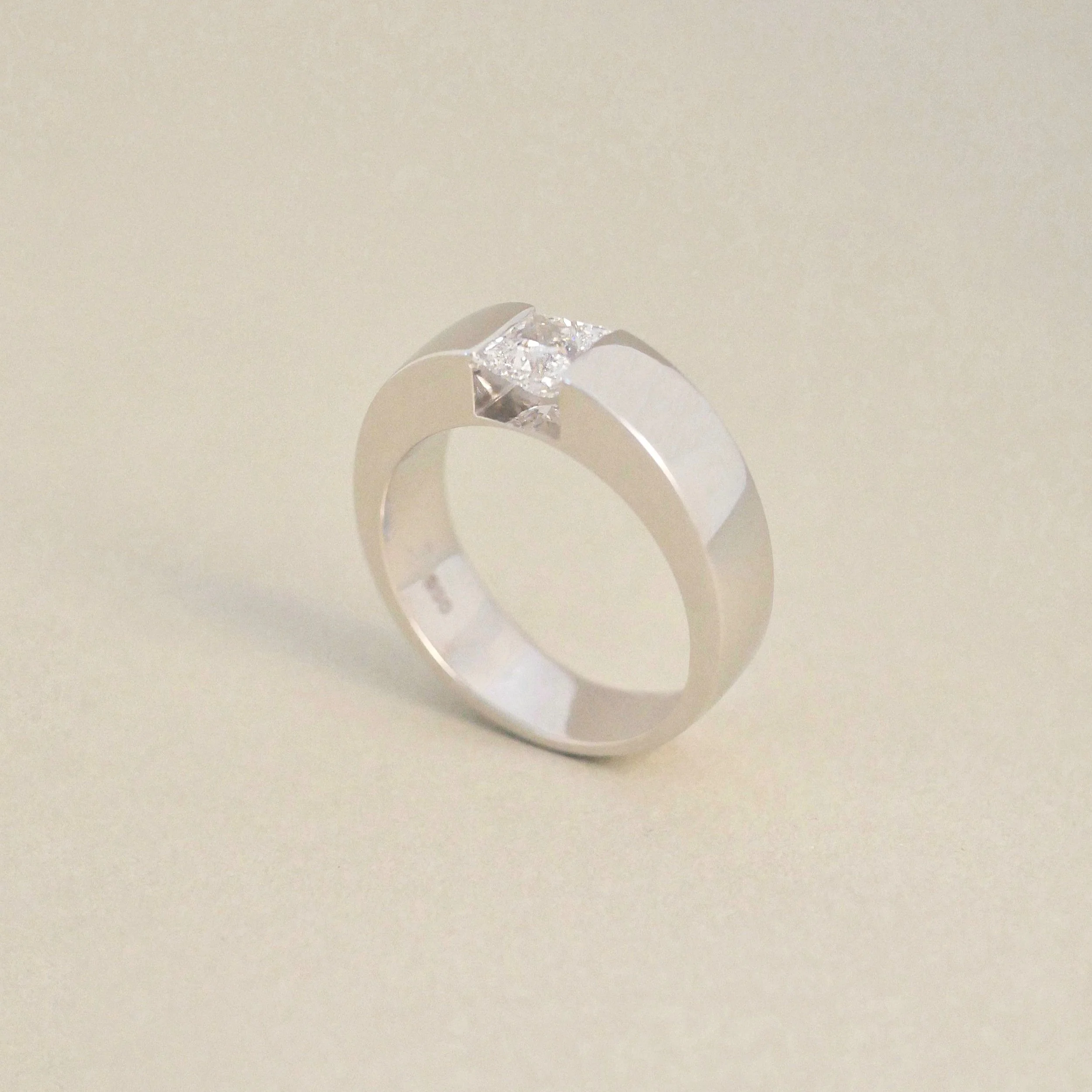 Platinum Tension Set Band Ring