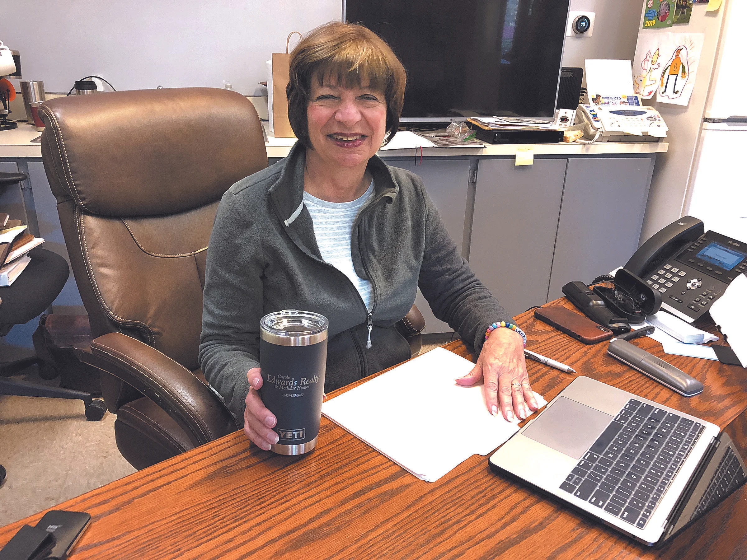 ENCOURAGEMENT Owner of a realty company, Carol Edwards advises potential women entreprenuers to perservere. Meg McNeil, below, finds inspiration in Beyoncé. Marge Feuerstein photos